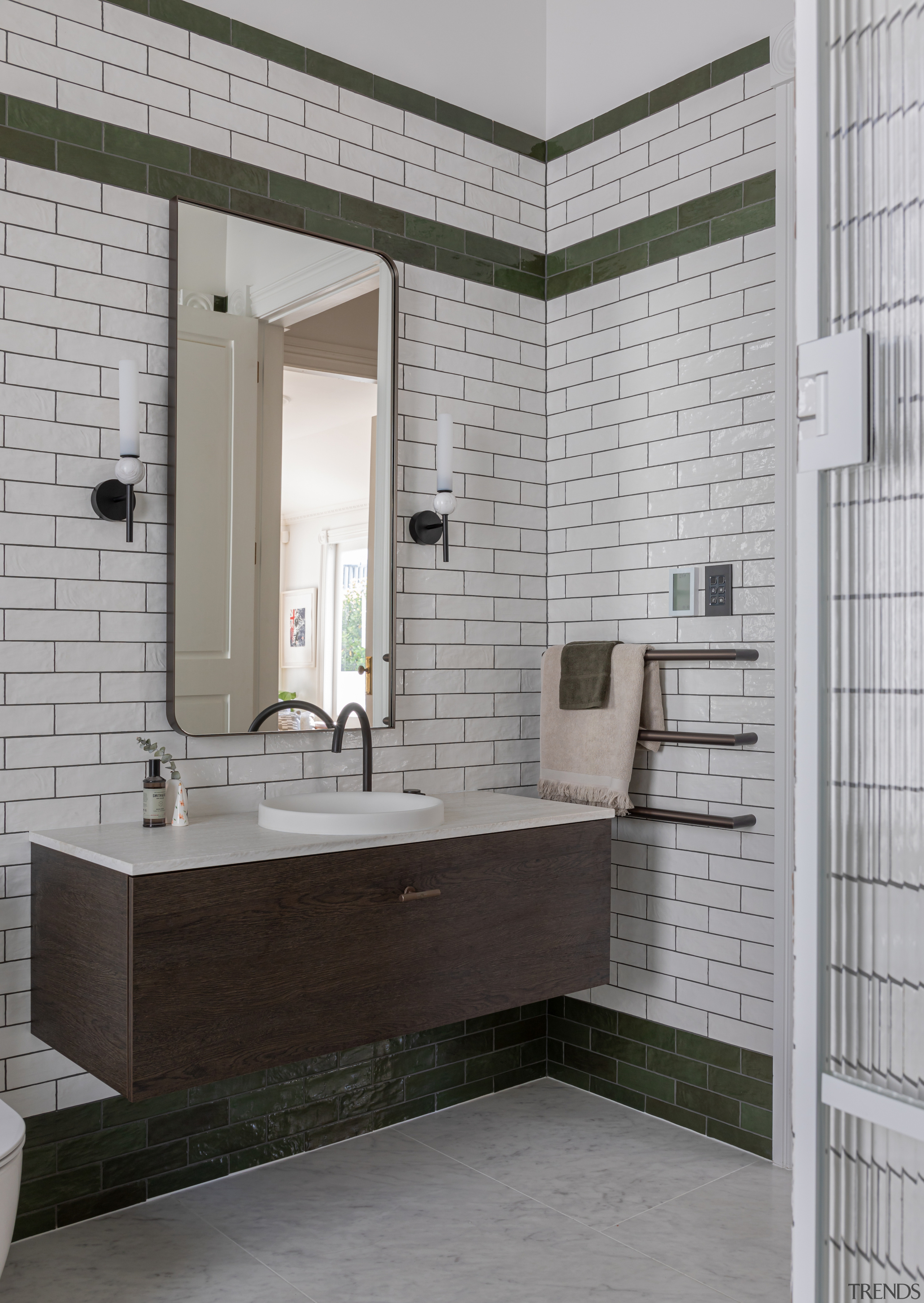 Brass tapware and accessories complete the boutique hotel 