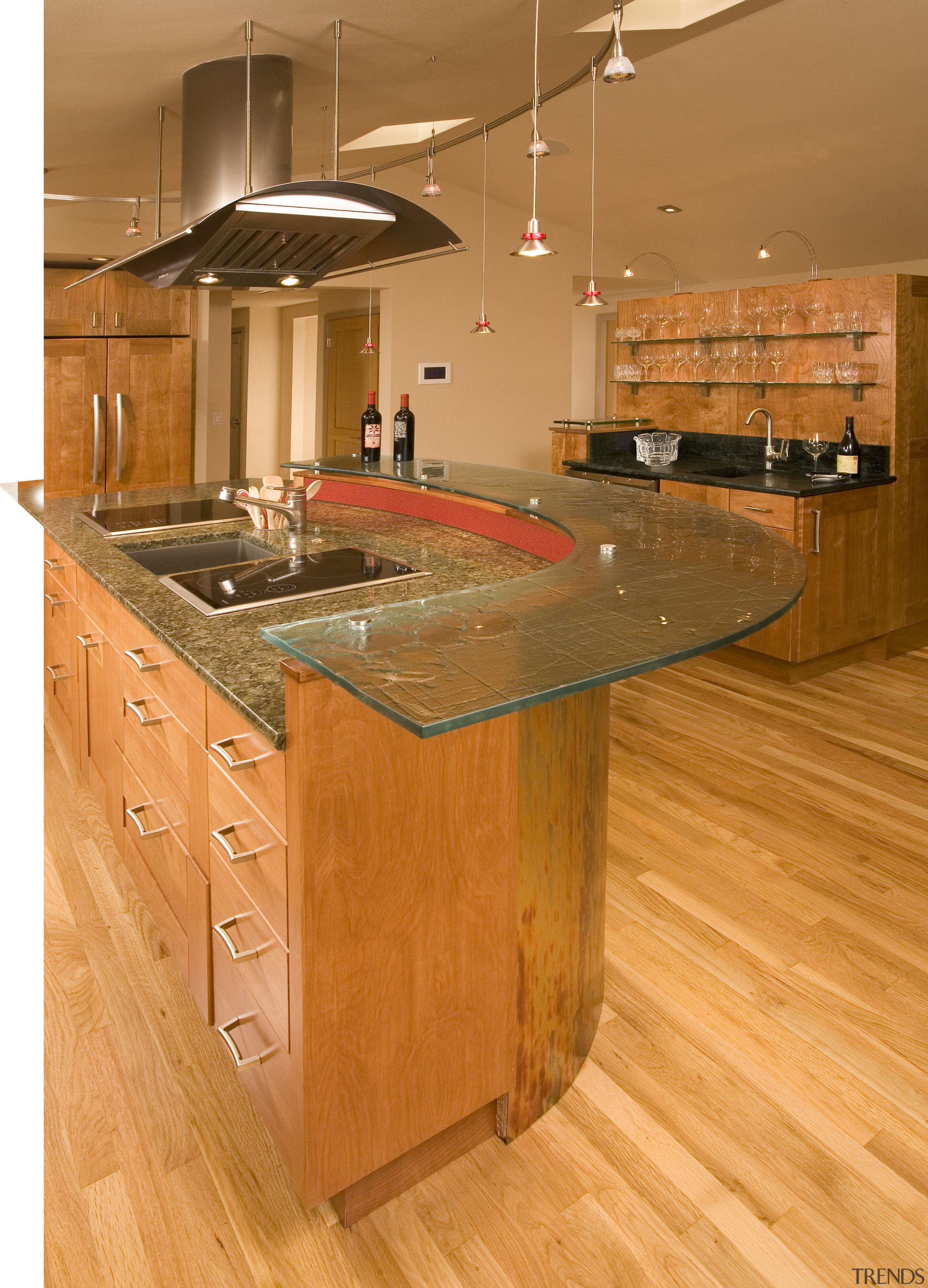 A view of a kitchen designed by Richard cabinetry, countertop, floor, flooring, hardwood, interior design, kitchen, laminate flooring, room, wood, wood flooring, wood stain, orange