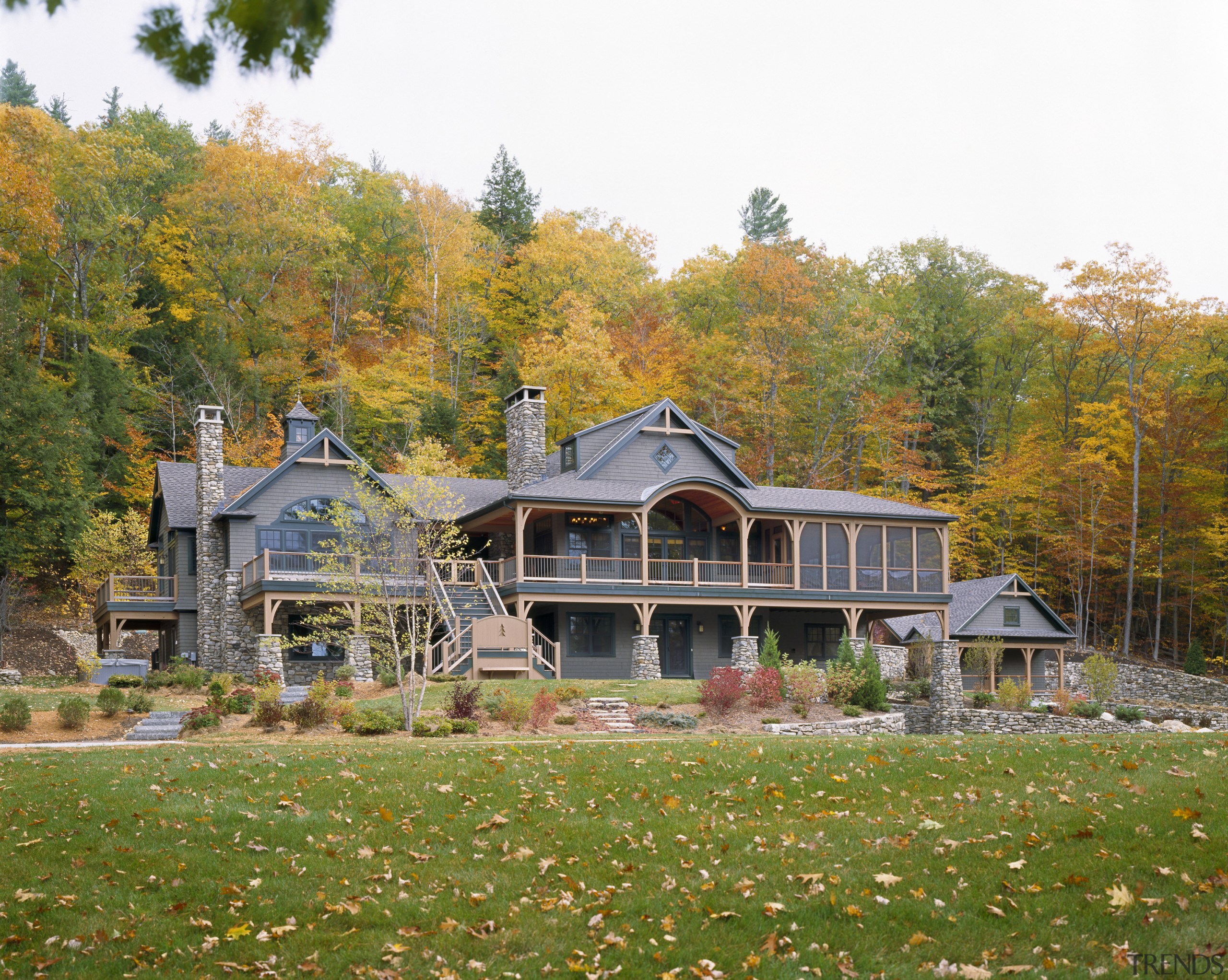 View of the holiday homes exterior featuring white autumn, cottage, estate, facade, farmhouse, grass, home, house, leaf, log cabin, mansion, nature, plant, property, real estate, tree, brown