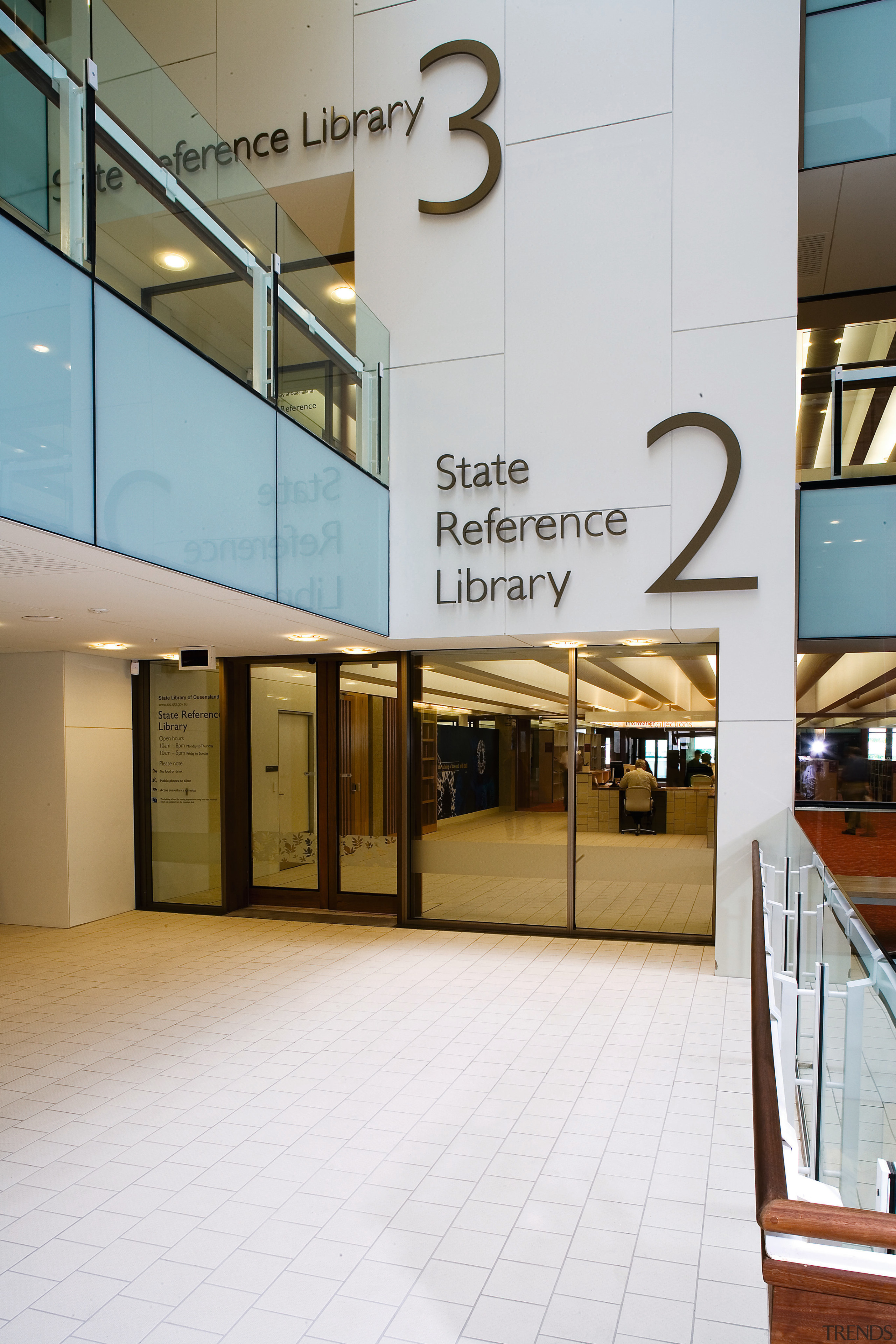 A view of some signage by Dot Dash. architecture, building, daylighting, floor, glass, lobby, shopping mall, white