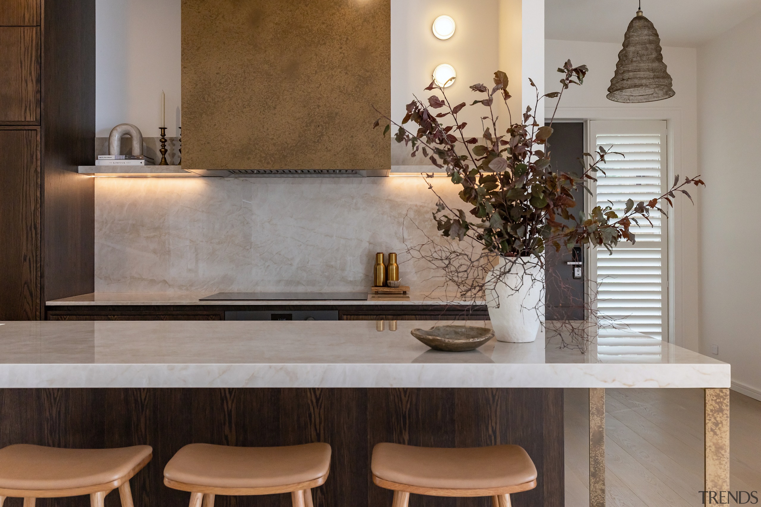 Casual seating tucks under the island benchtop. 