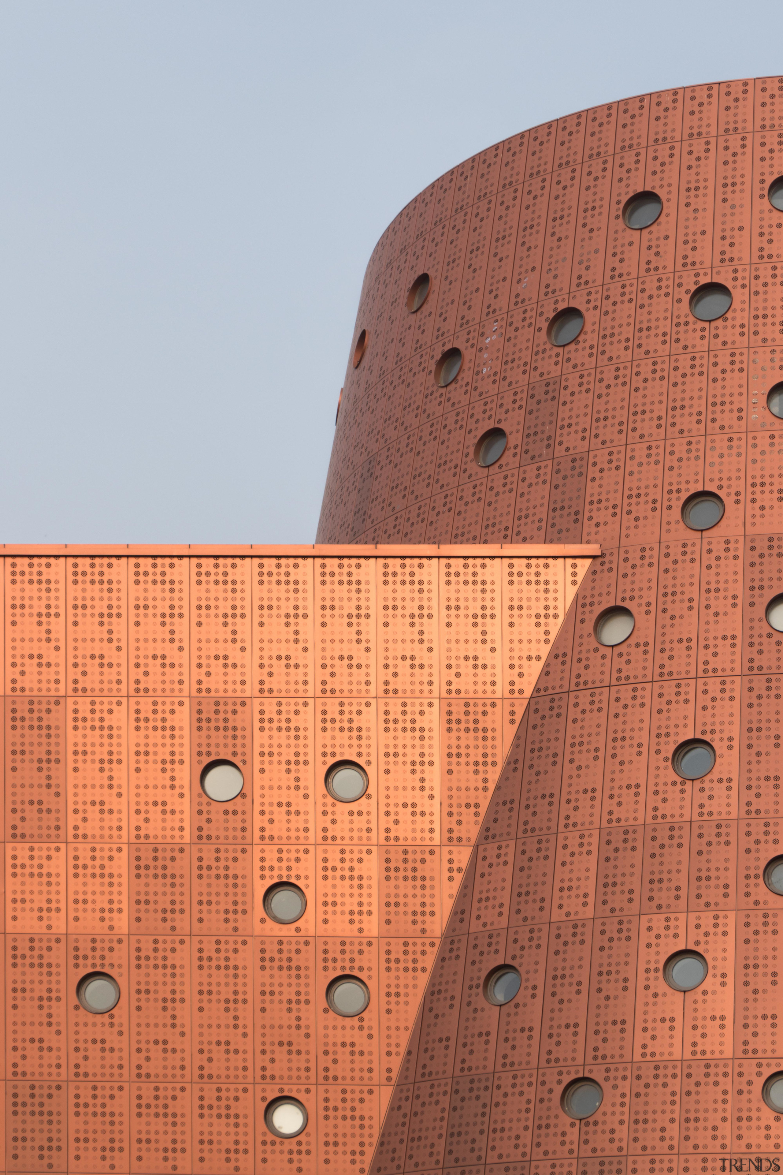 Round skylights in the museum facade admit natural architecture, brick, wall, orange, gray