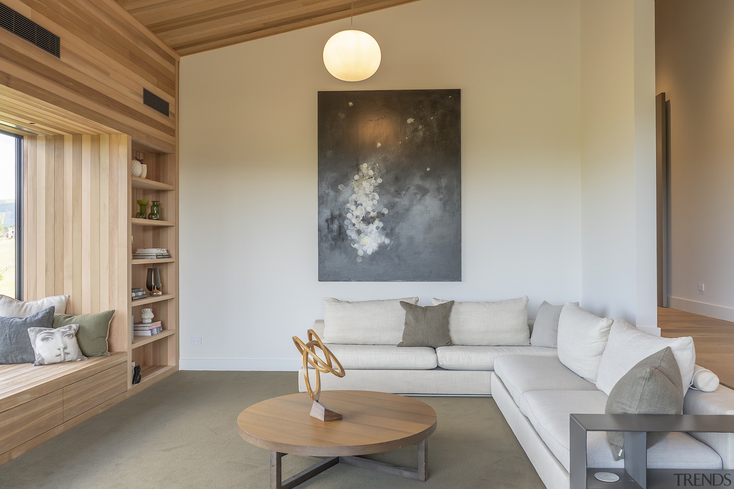 Living area with modular sofa, window seat and 
