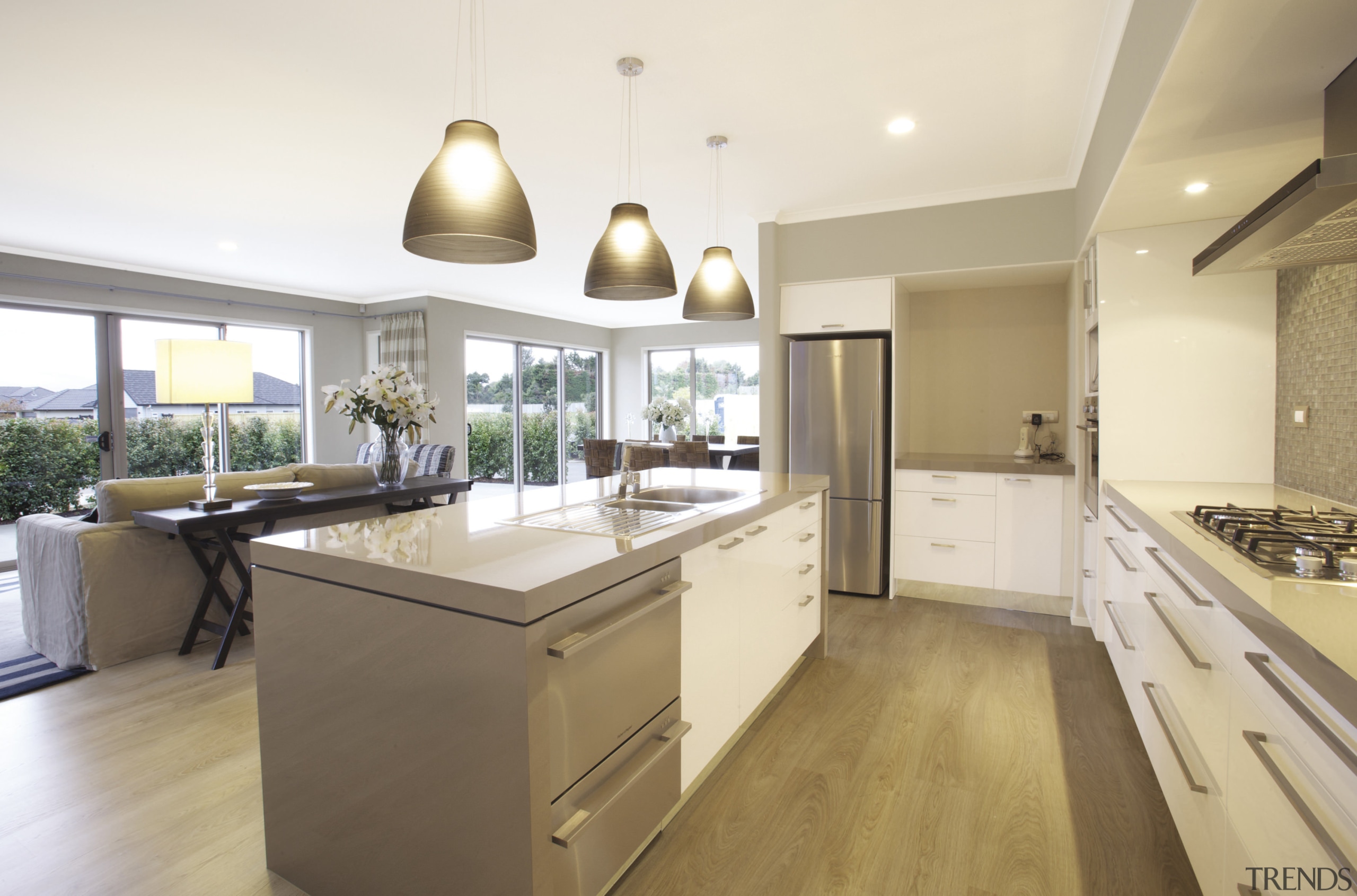 View of kitchen area at Platinum Homes show countertop, cuisine classique, interior design, kitchen, property, real estate, room, white, brown