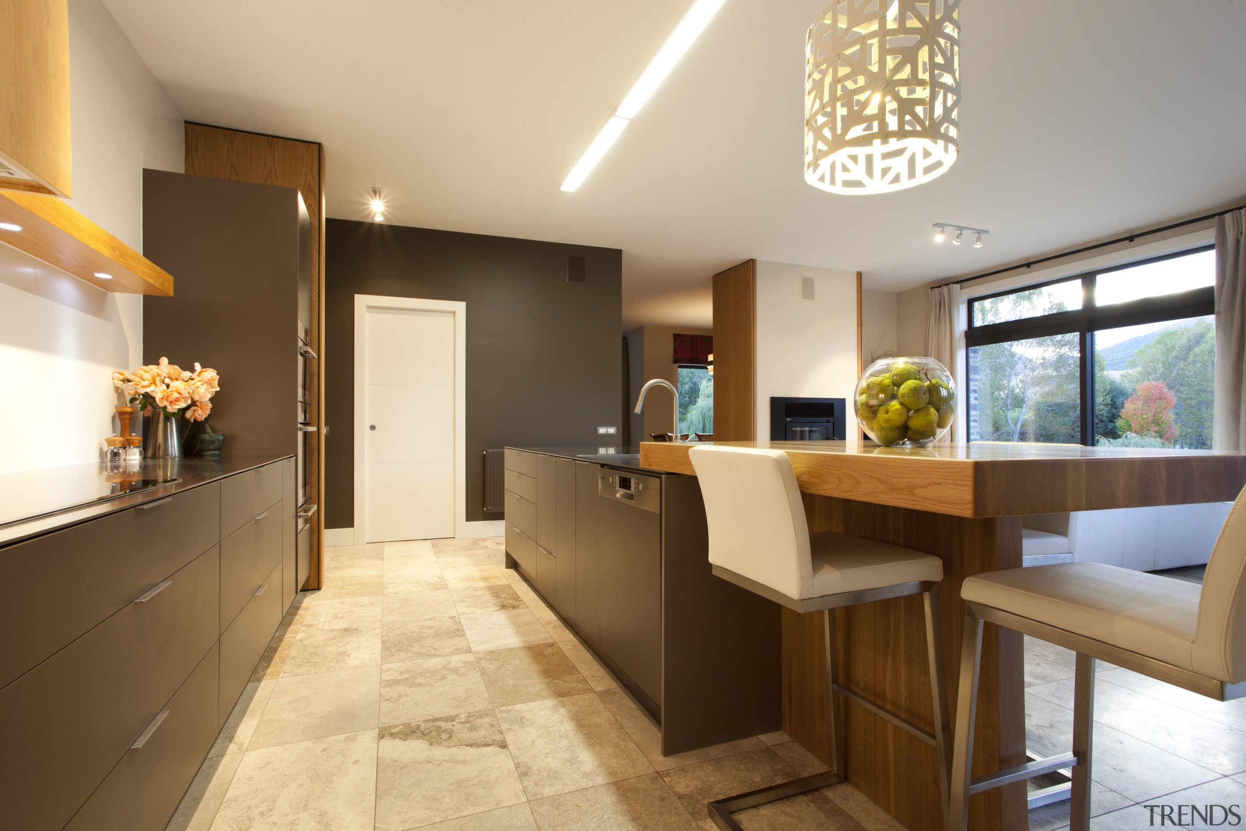 white walls and doors, dark cabinets and wooden countertop, interior design, kitchen, real estate, room, brown, orange, white