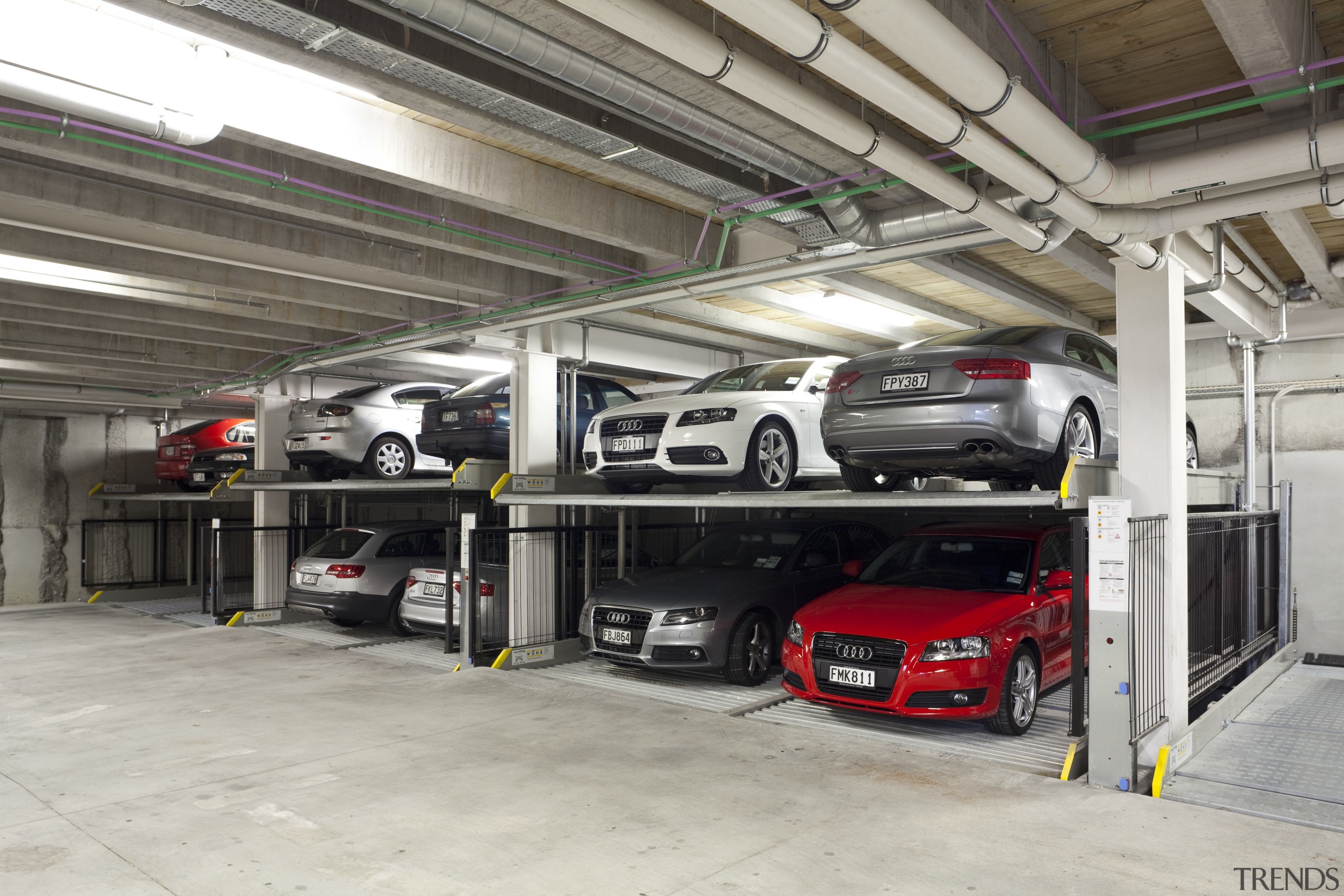 View of the underground car parking at the automobile repair shop, automotive design, automotive exterior, automotive wheel system, car, executive car, garage, luxury vehicle, motor vehicle, parking, parking lot, vehicle, gray