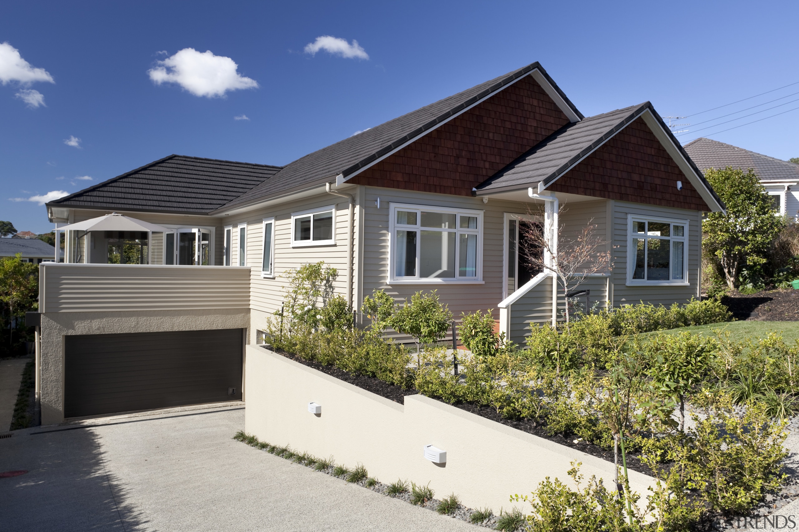 View of exterior with cream cladding. - View building, cottage, elevation, estate, facade, home, house, neighbourhood, property, real estate, residential area, siding, suburb