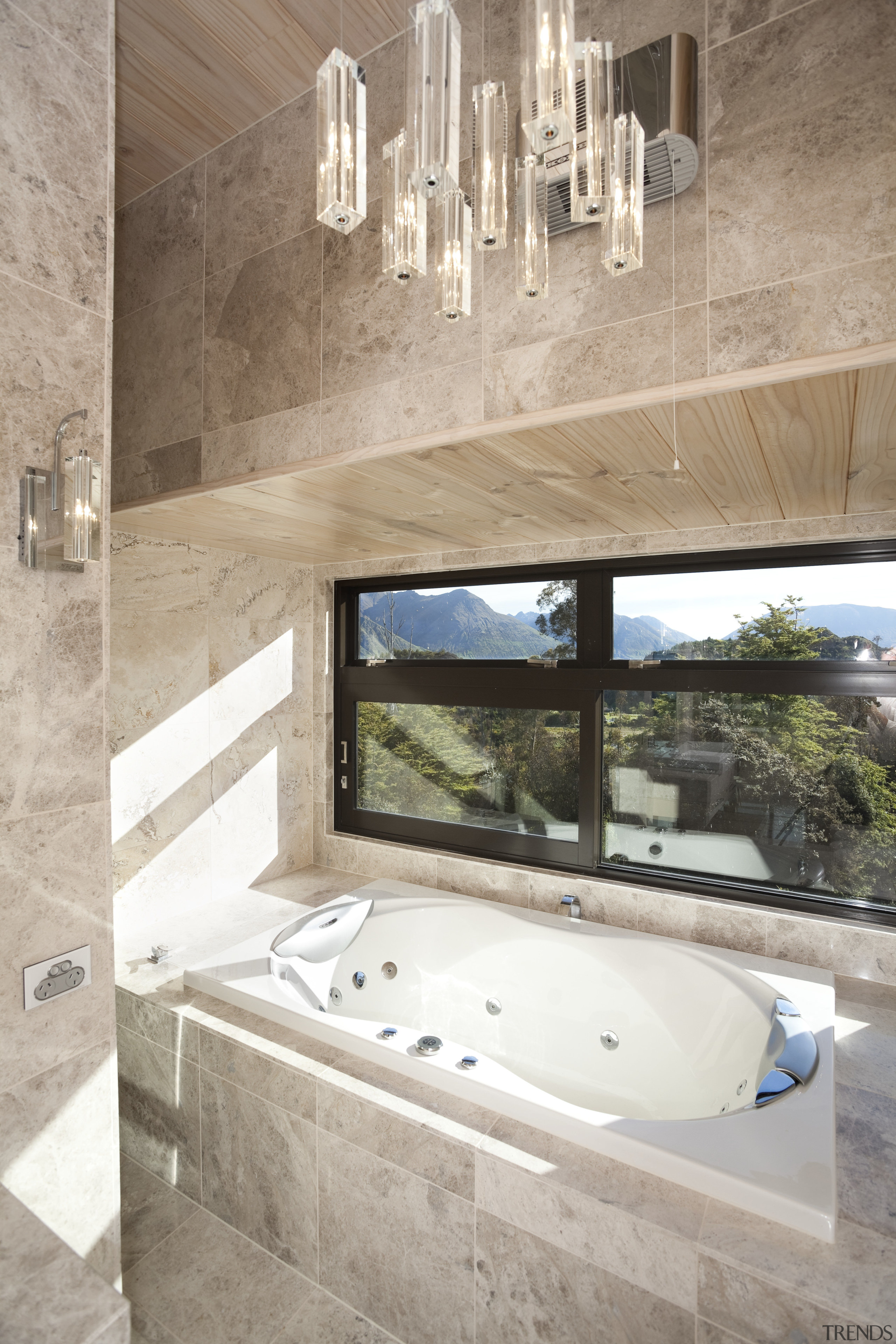 This bathroom in a Lockwood home features a architecture, bathroom, bathtub, estate, floor, flooring, home, interior design, property, room, tile, gray