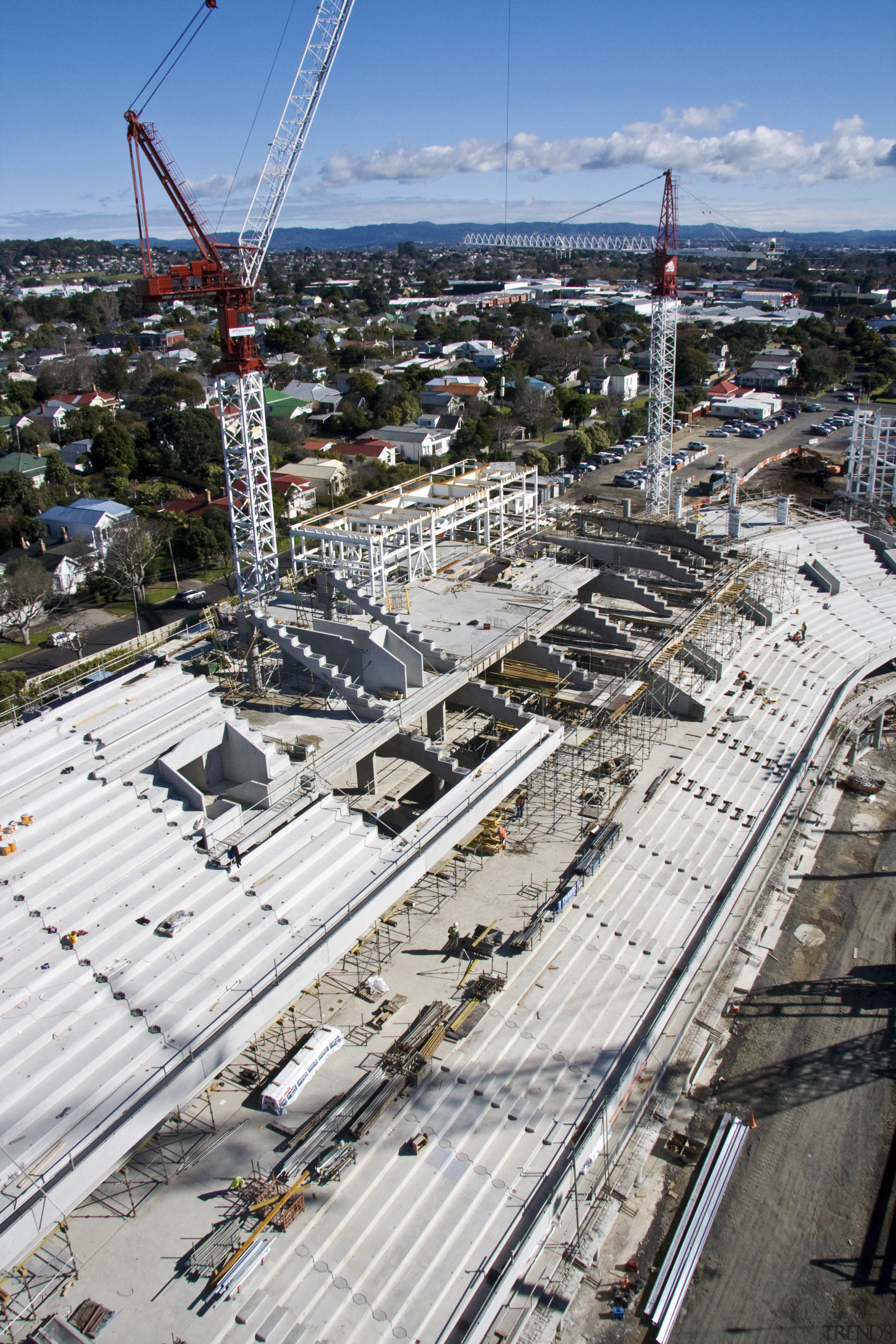 View of Eden Park's new South Stand which aerial photography, bird's eye view, building, city, construction, metropolis, metropolitan area, sky, transport, urban area, white