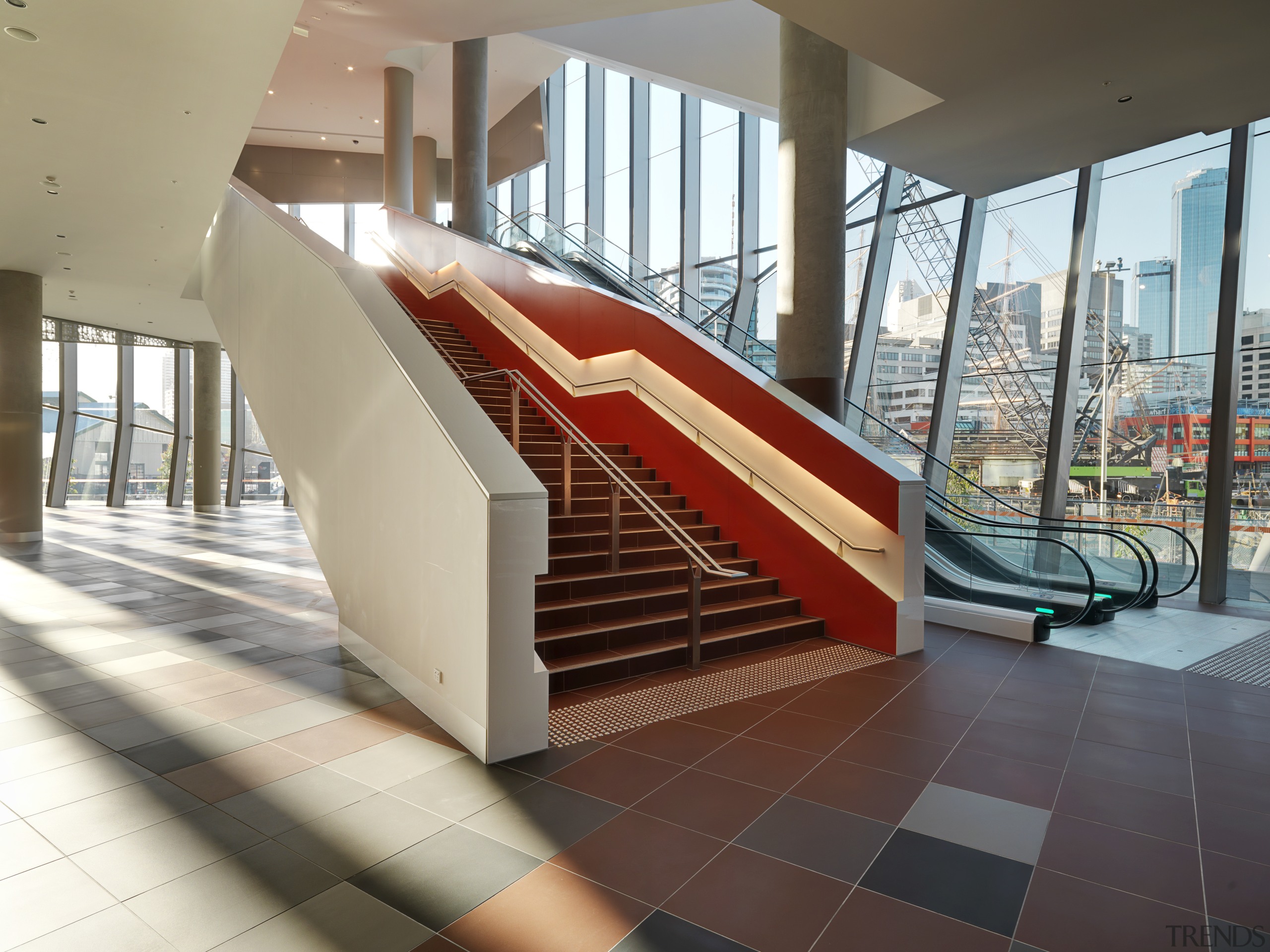 Interior view of the Melbourne Convention Centre which architecture, floor, interior design, stairs, structure, gray