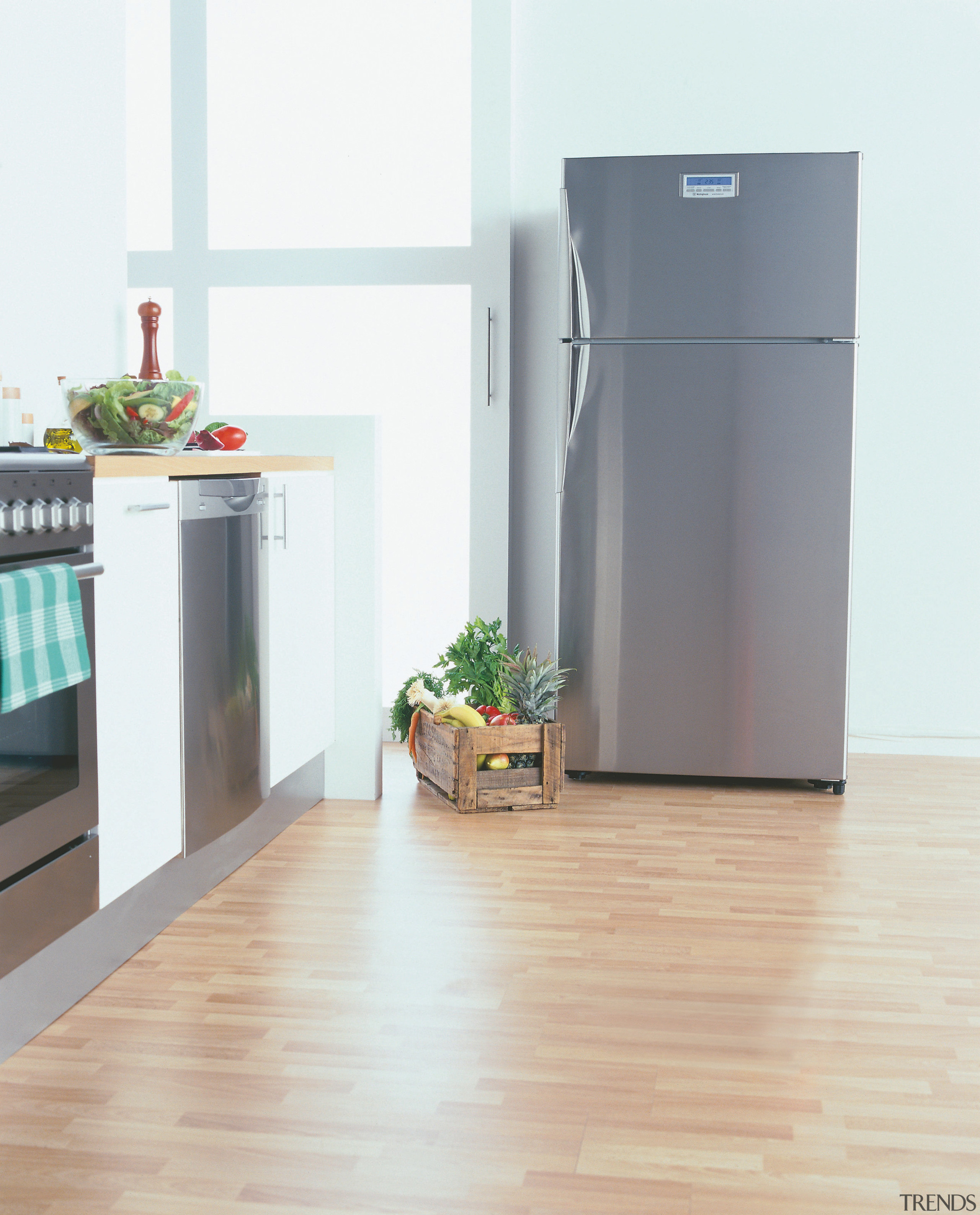 Stylish Refrigerator in kitchen setting. - Stylish Refrigerator floor, flooring, hardwood, home appliance, kitchen appliance, laminate flooring, major appliance, product, refrigerator, white, gray