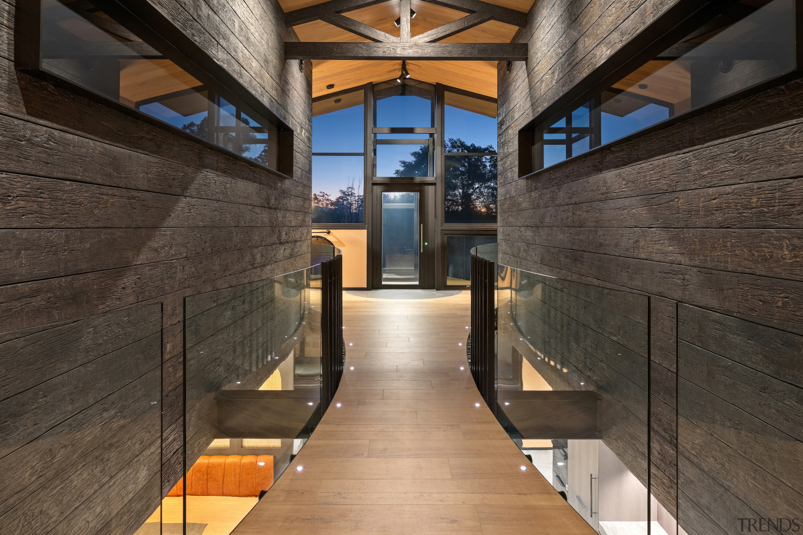 The upstairs walkway with glimpses down through the 