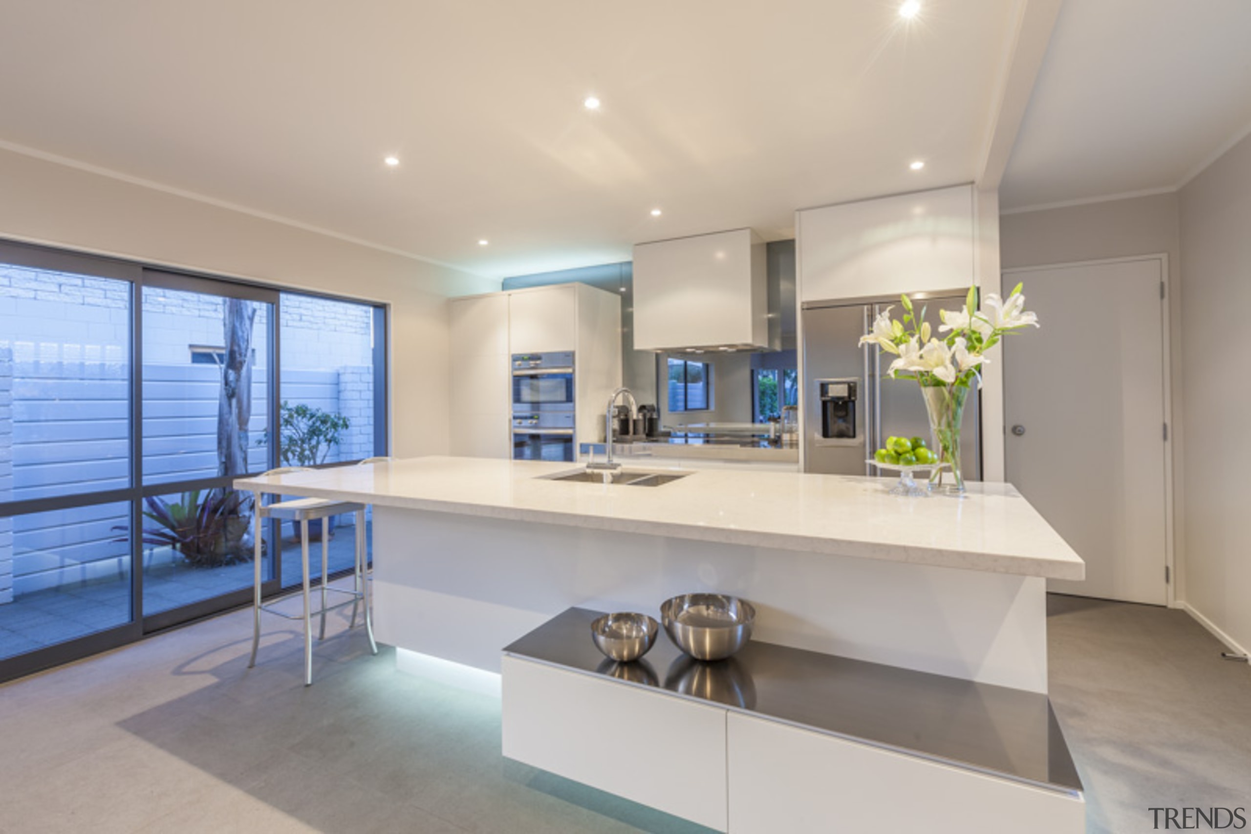 Knife-edge stainless steel shelf on top of drawers architecture, house, interior design, kitchen, real estate, gray