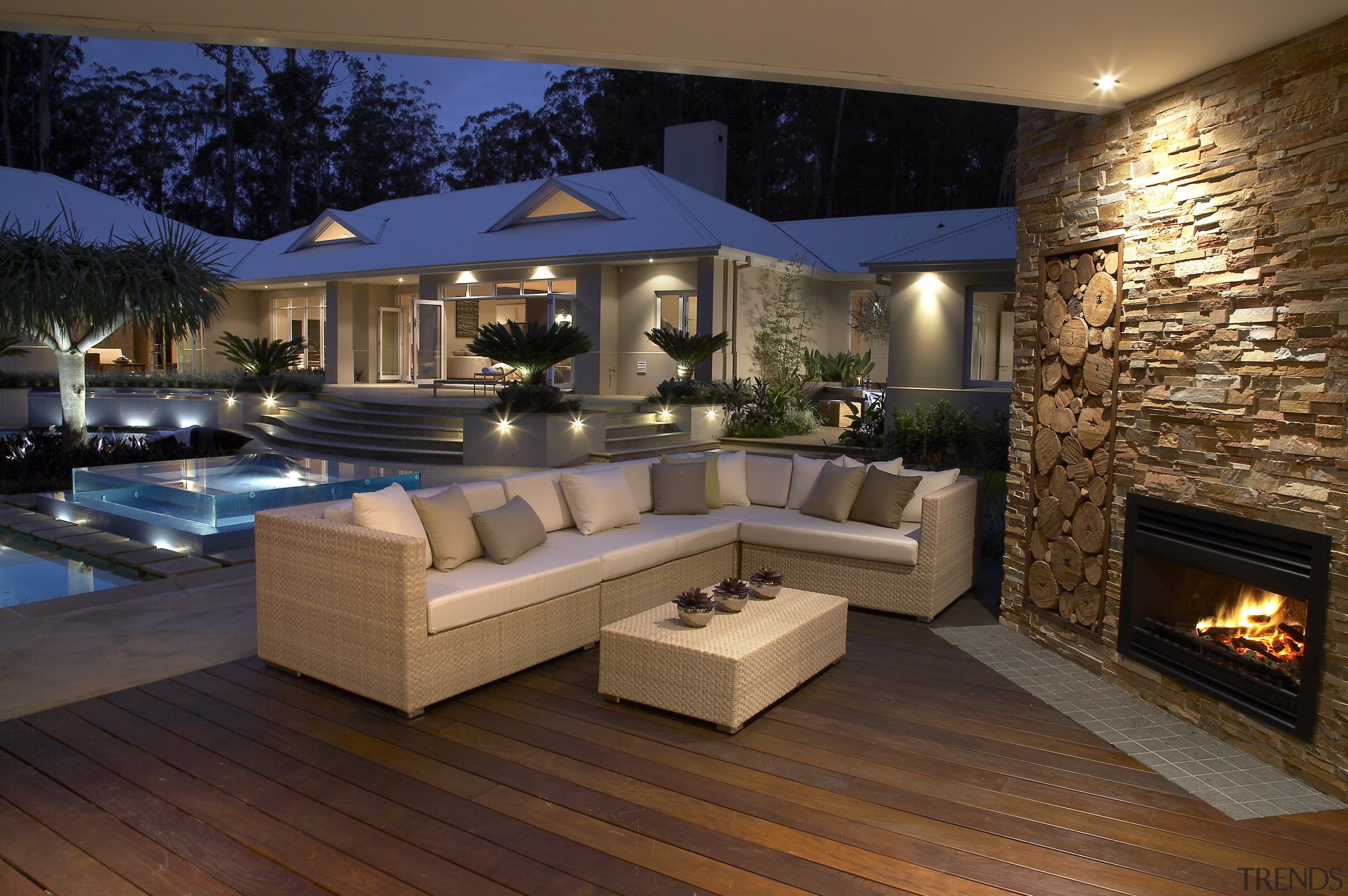 Denton Homes focuses on the highend of the estate, fireplace, floor, home, interior design, lighting, living room, patio, real estate, wood, brown