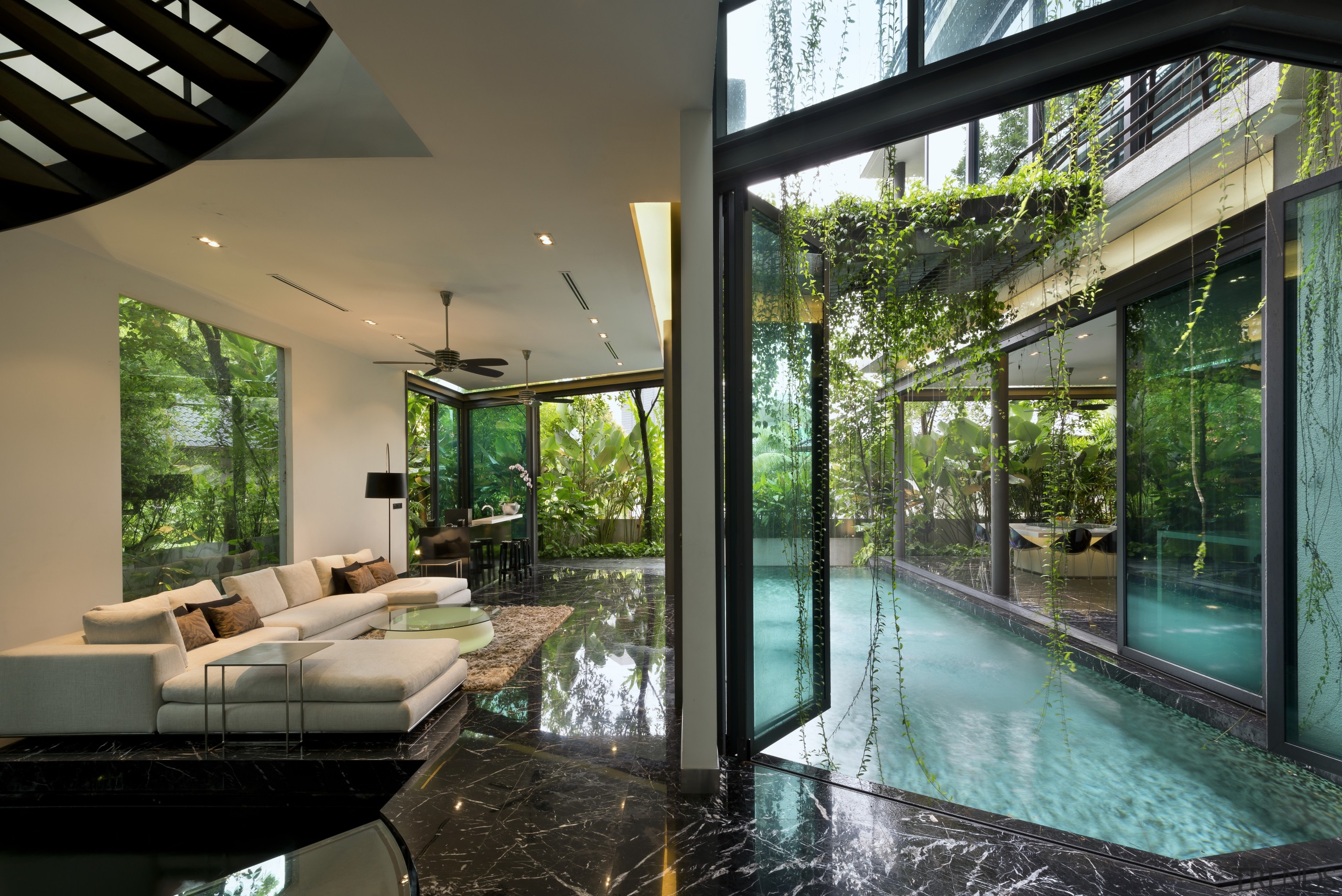 In this tropical, kampong-style house the living areas architecture, condominium, estate, home, house, interior design, property, real estate, swimming pool, window, black
