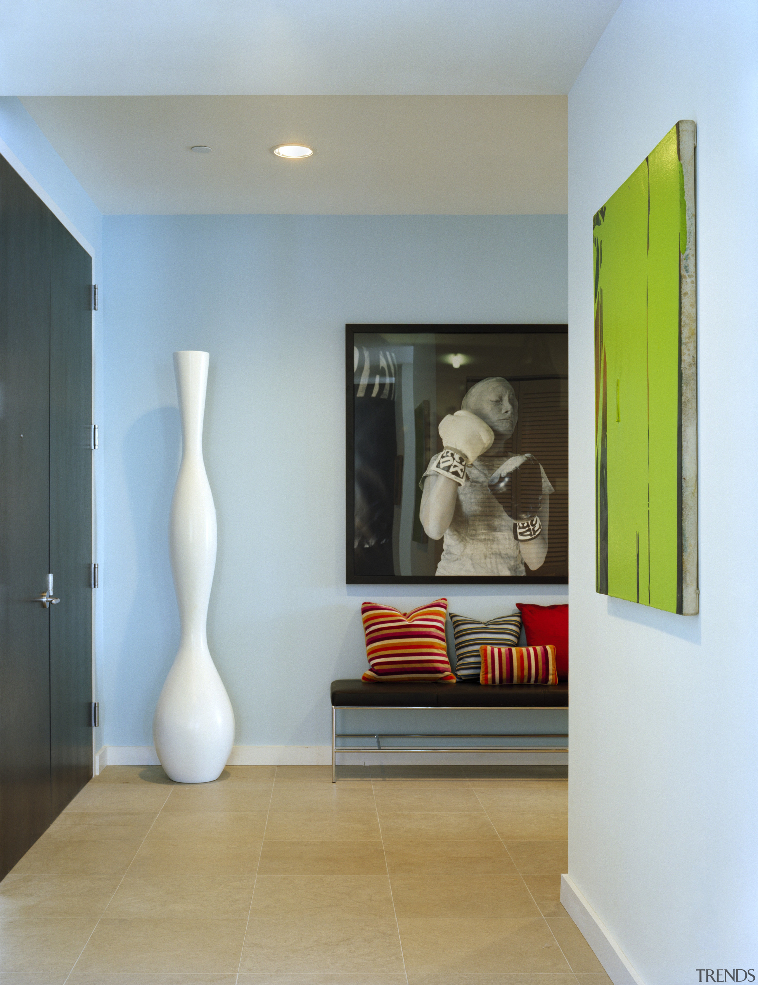 An interior view of this contemporary living area ceiling, floor, flooring, home, house, interior design, room, shelf, shelving, wall, gray