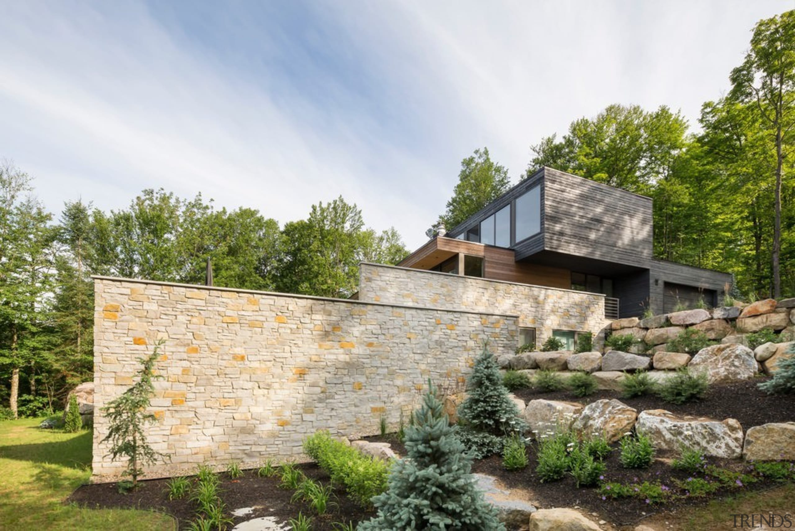 Stone walls lead the eye out across the architecture, cottage, estate, facade, farmhouse, home, house, property, real estate, stone wall, wall, white, brown