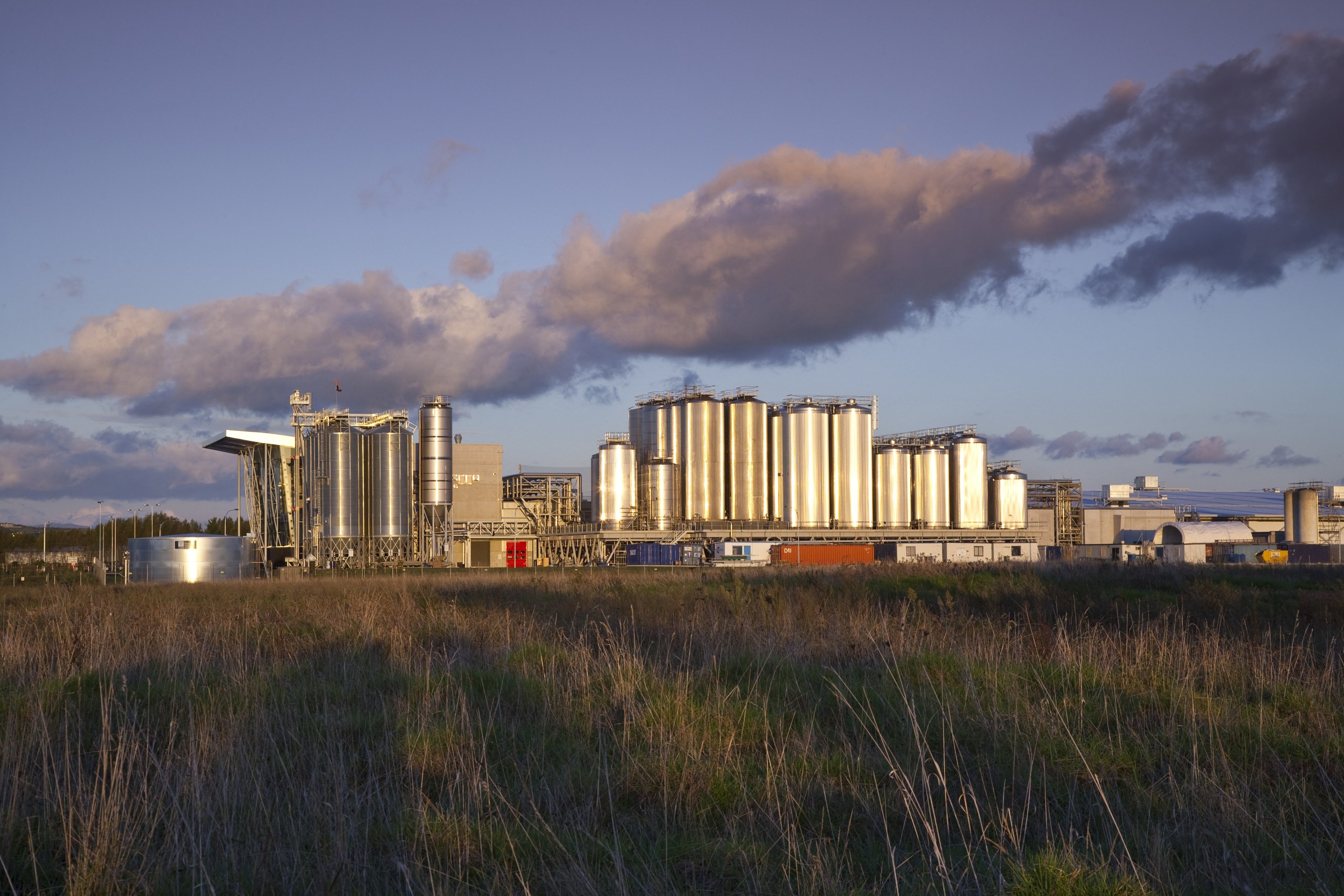 Lion's new HQ in South Auckland - Lion&apos;s city, cityscape, cloud, dusk, evening, horizon, meteorological phenomenon, real estate, residential area, sky, skyline, suburb, urban area, black