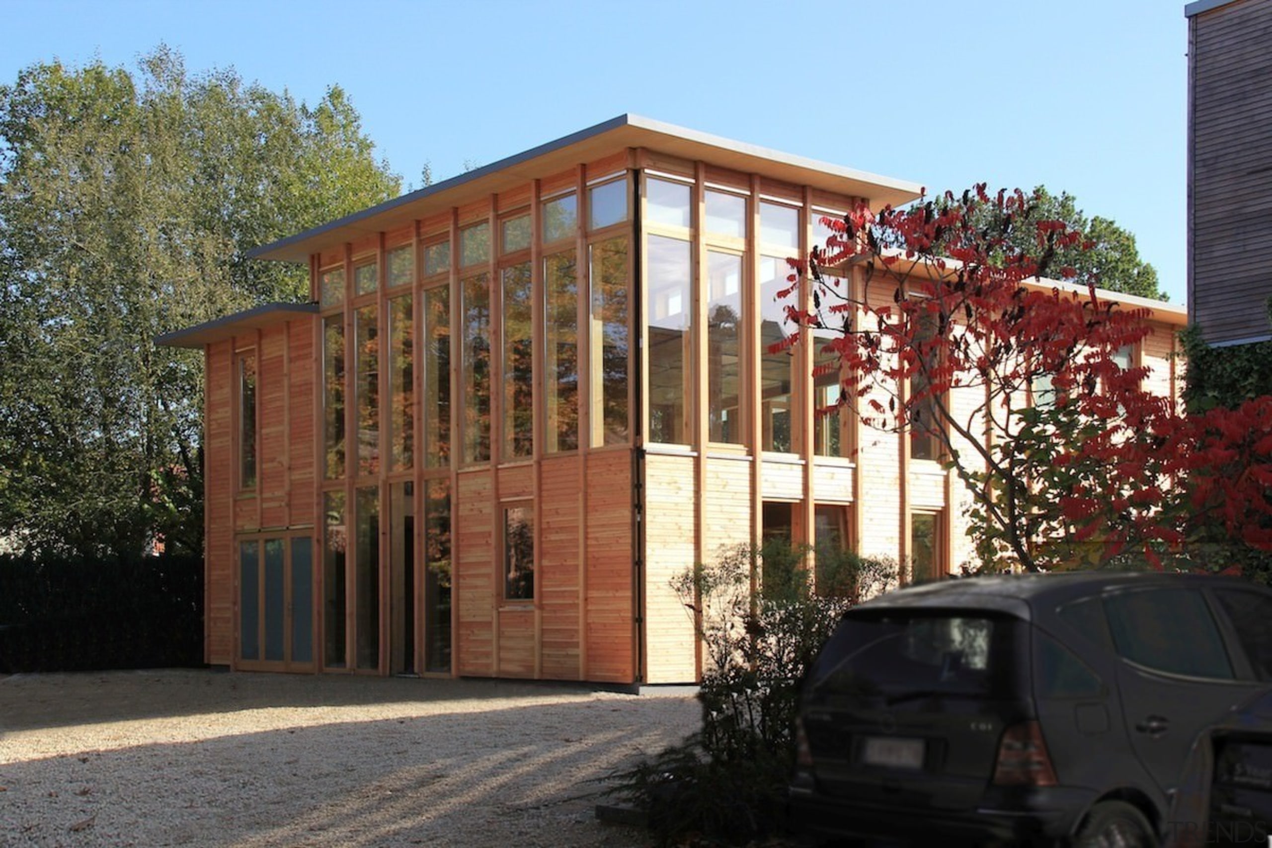 There's almost an eastern influence to the home architecture, building, facade, home, house, property, real estate, residential area, roof, shed, window, black