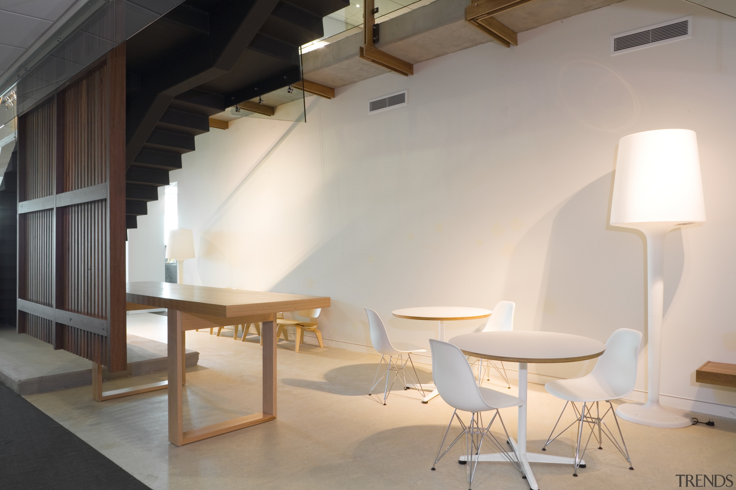 An interior view of the office building  architecture, ceiling, chair, daylighting, floor, furniture, house, interior design, loft, product design, table, wall, gray