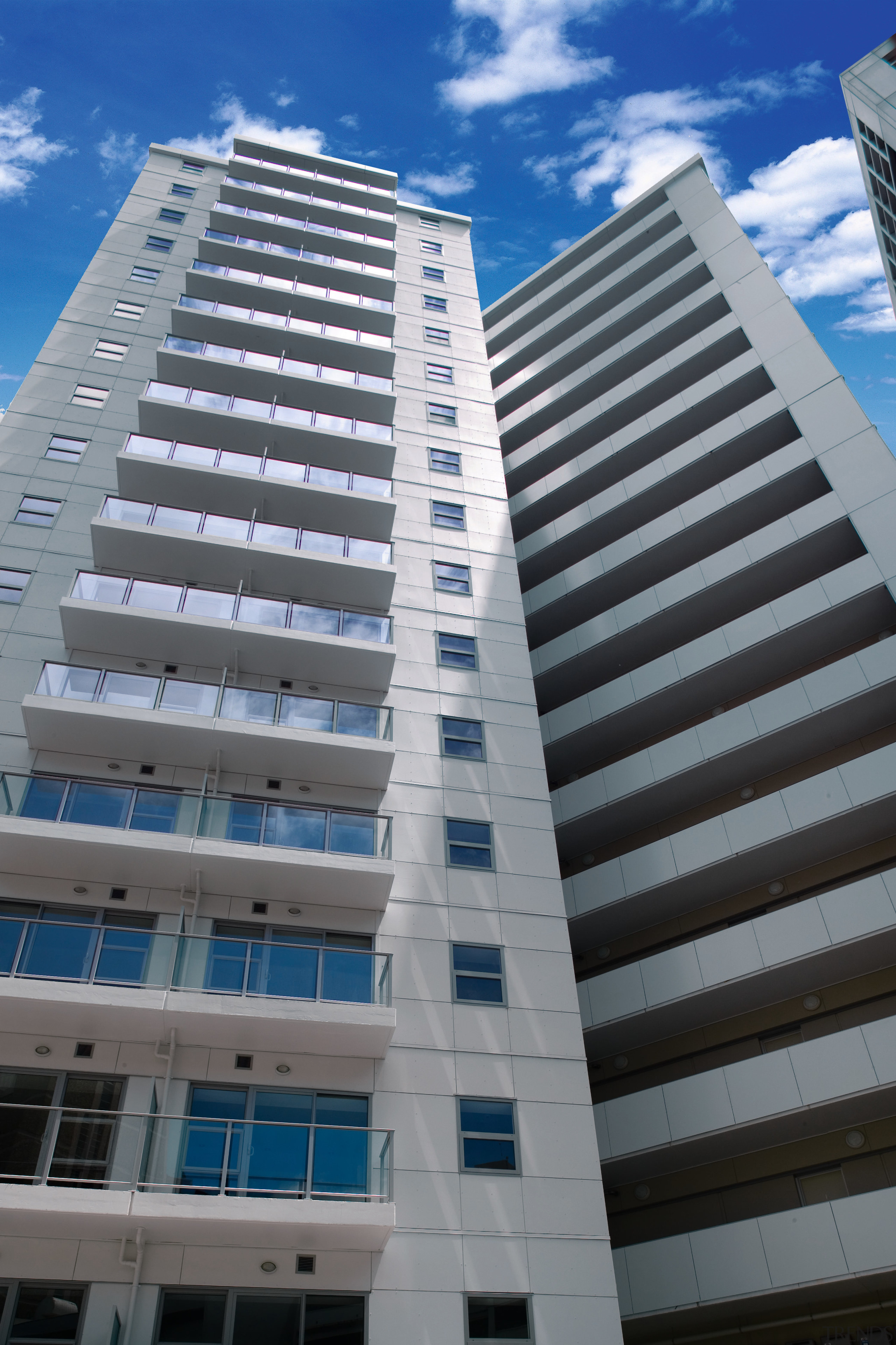A view of some cladding by PBS Group. apartment, architecture, building, commercial building, condominium, corporate headquarters, daytime, facade, headquarters, hotel, metropolis, metropolitan area, mixed use, property, real estate, residential area, sky, skyscraper, tower block, gray