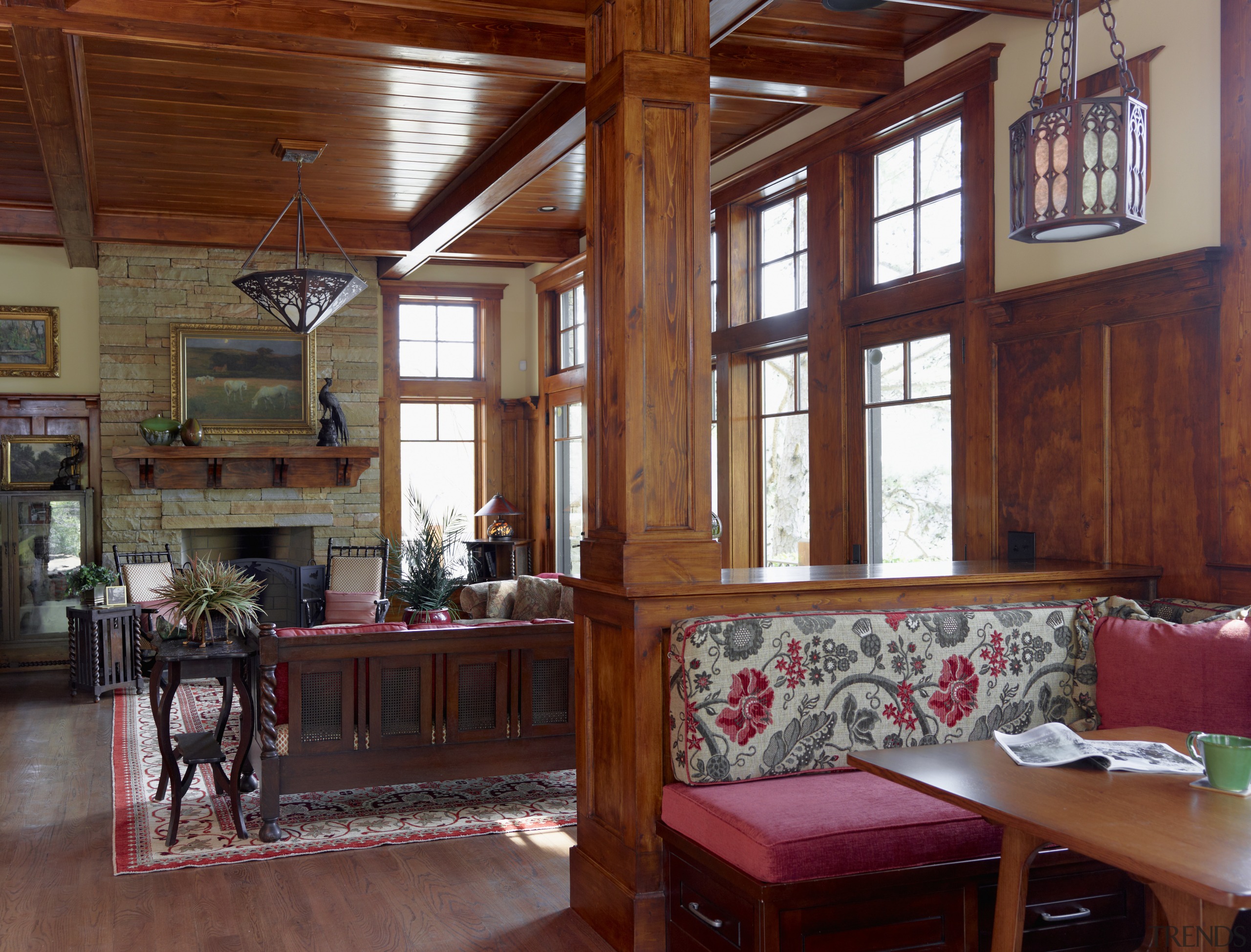 This lakefront house was remodeled to reference the ceiling, furniture, hardwood, home, interior design, living room, real estate, room, window, wood, red, brown