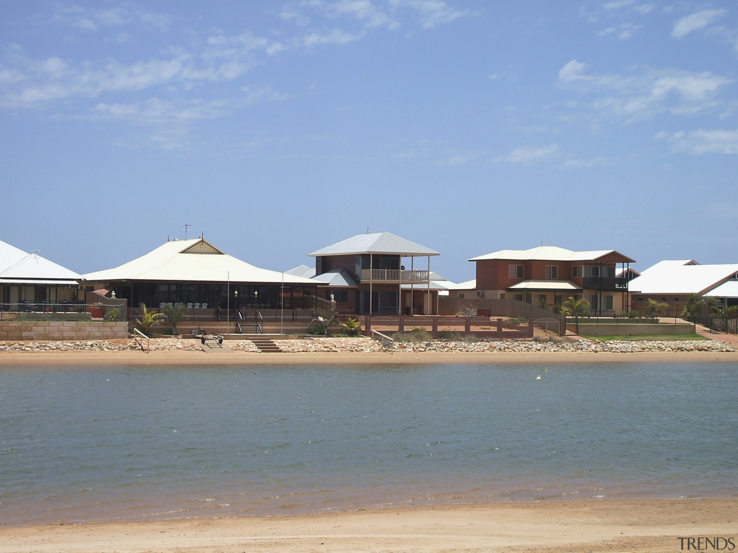 View of the Carnarvon doreshore in Gascoyne which beach, cloud, coast, property, real estate, resort, roof, sea, sky, vacation, teal
