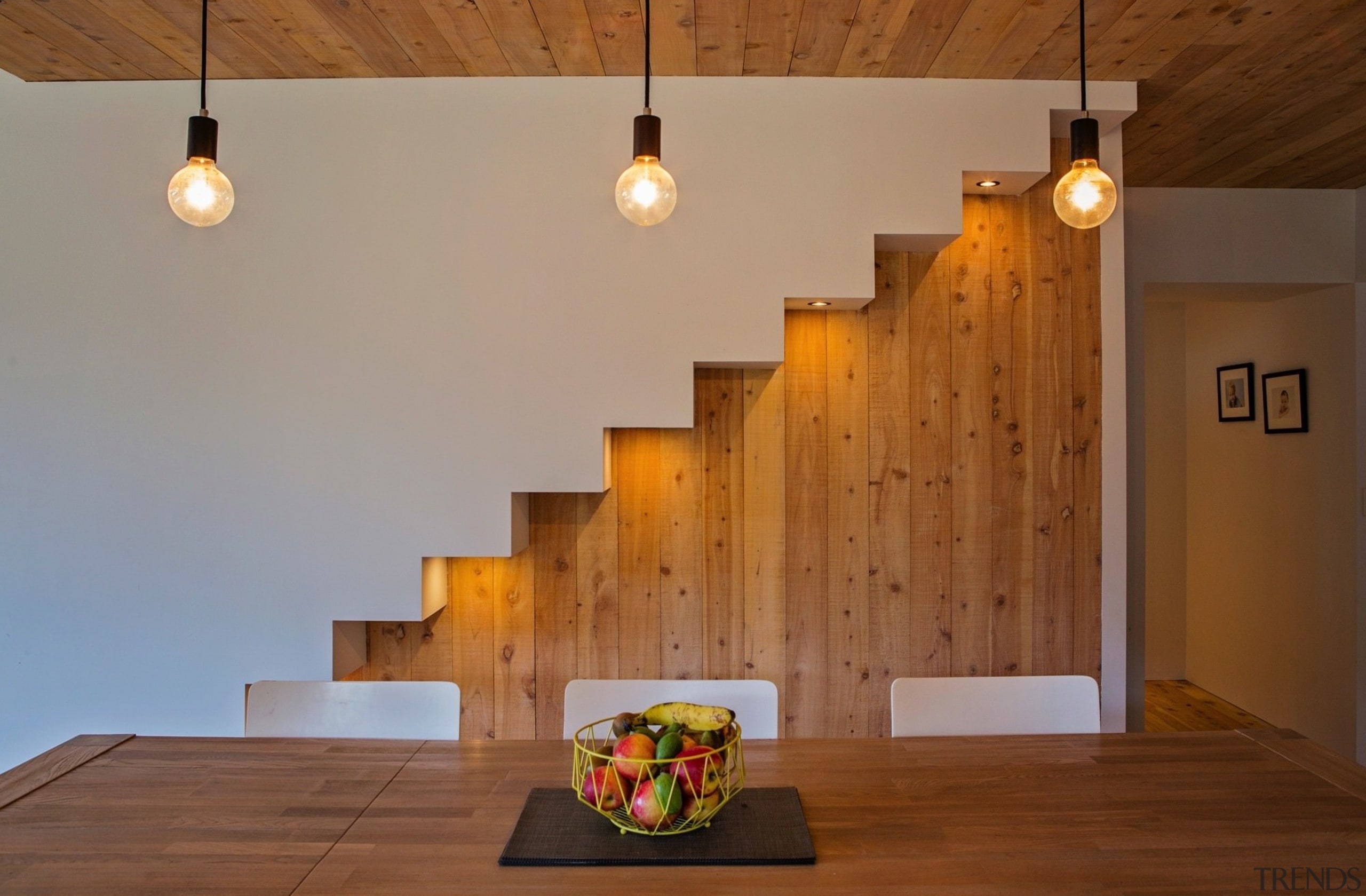 Wood contrasts with white walls - Wood contrasts architecture, ceiling, floor, flooring, hardwood, home, house, interior design, light fixture, lighting, stairs, wall, wood, brown, gray