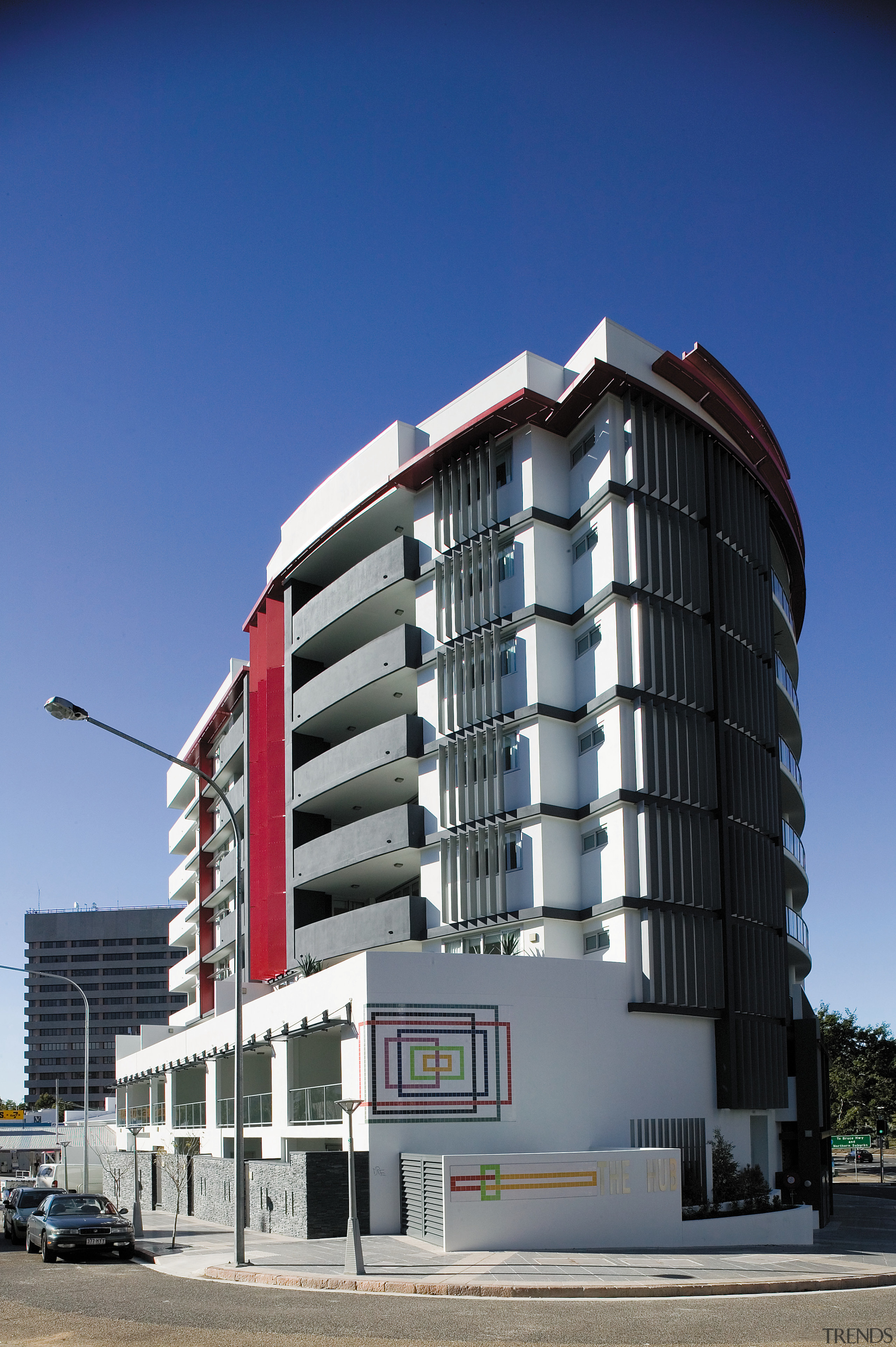 View of the exterior of the HUB apartment apartment, architecture, building, city, commercial building, condominium, corporate headquarters, daytime, facade, headquarters, hotel, house, metropolis, metropolitan area, mixed use, real estate, residential area, sky, tower block, blue