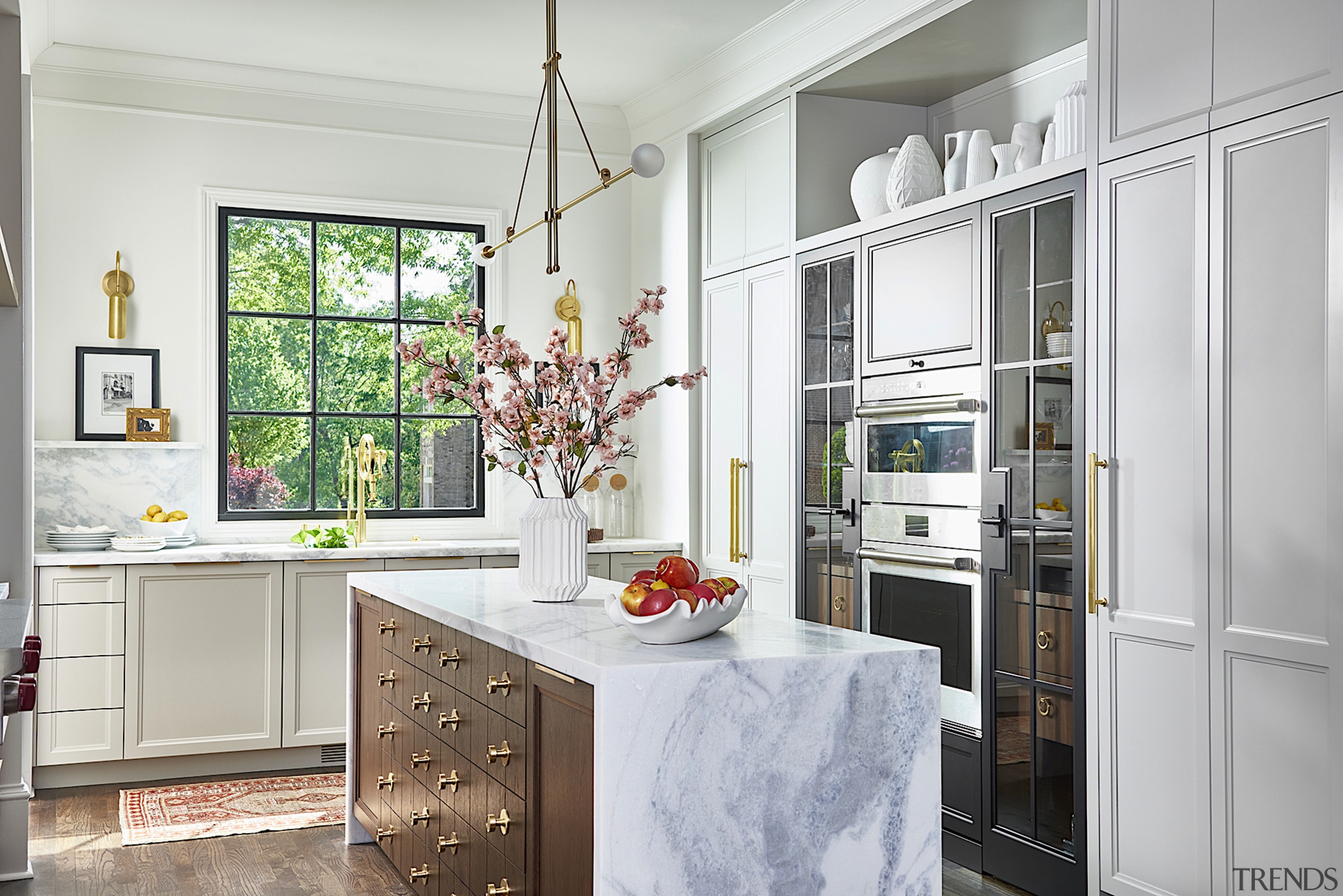 Panelled cabinetry adds to the traditional vibe. 