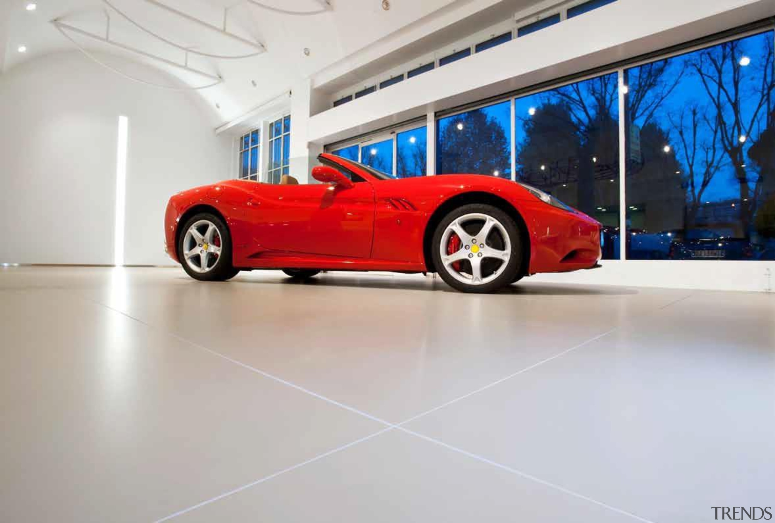 Laminam is a new concept in decorative surfaces automotive design, car, ferrari california, floor, land vehicle, luxury vehicle, motor vehicle, performance car, race car, red, sports car, supercar, vehicle, gray, white