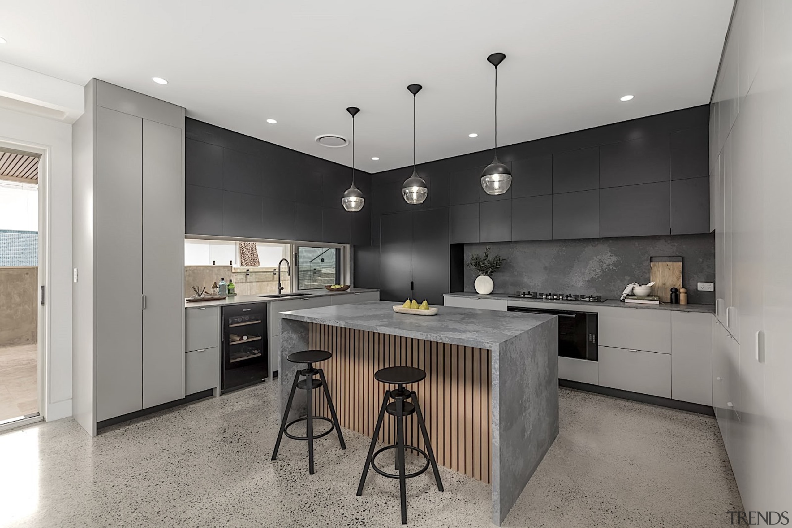 Contemporary kitchen with waterfall benchtop adjacent to outdoor 