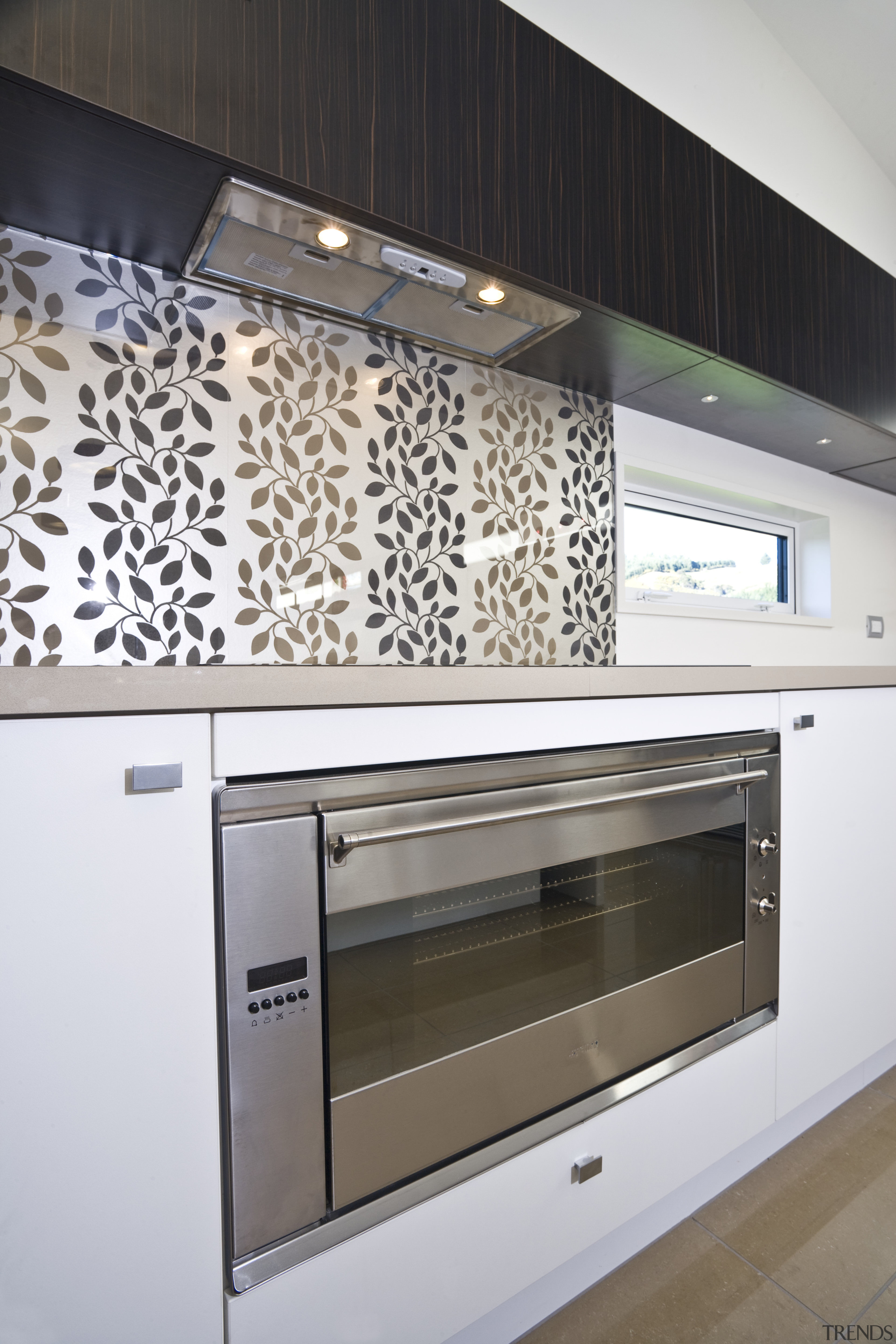 View of kitchen of a DRH show home countertop, floor, flooring, home appliance, interior design, kitchen, kitchen appliance, kitchen stove, oven, wall, white