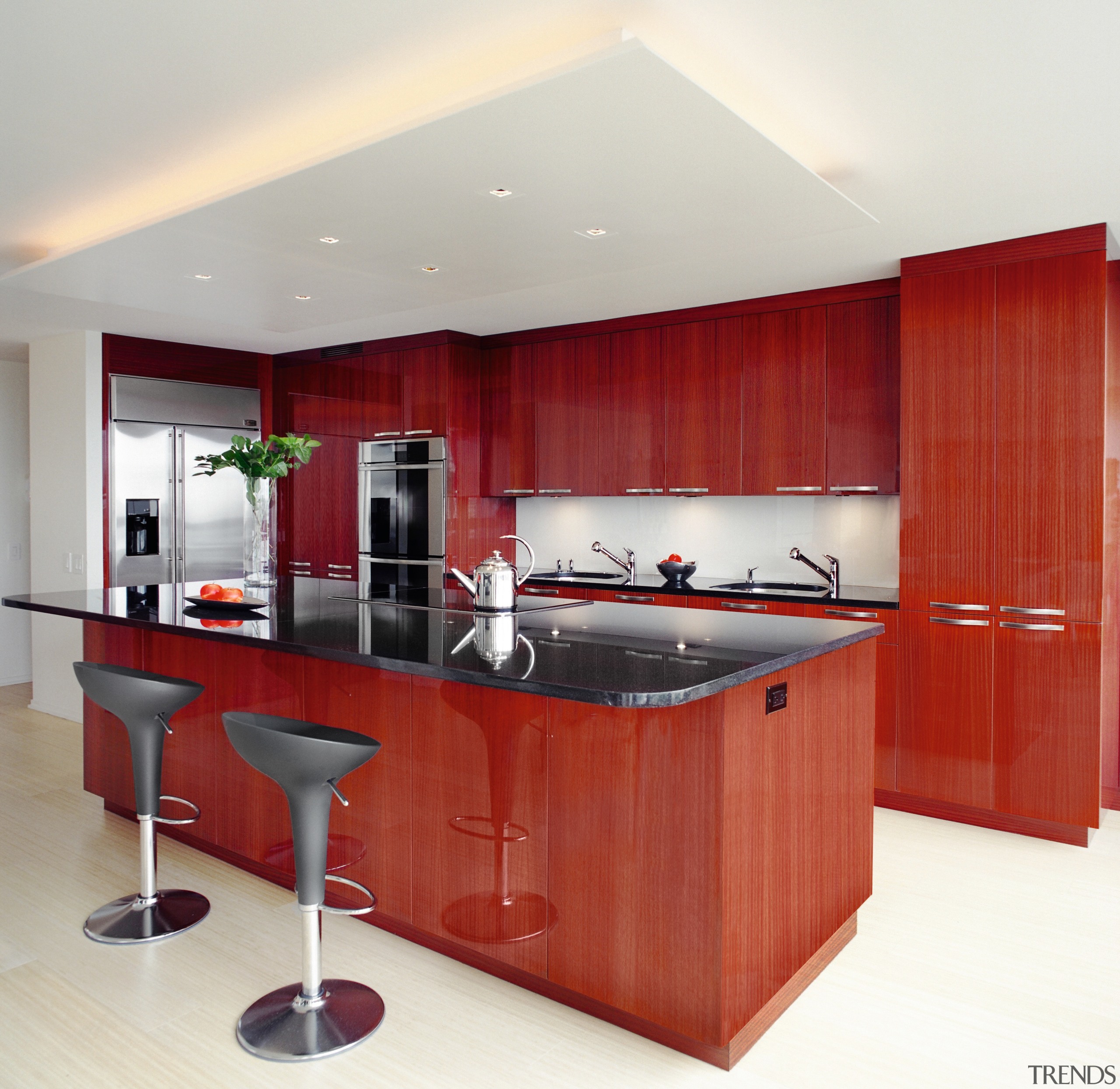 A view of this kitchen features cabinets by cabinetry, countertop, cuisine classique, interior design, kitchen, room, white, red