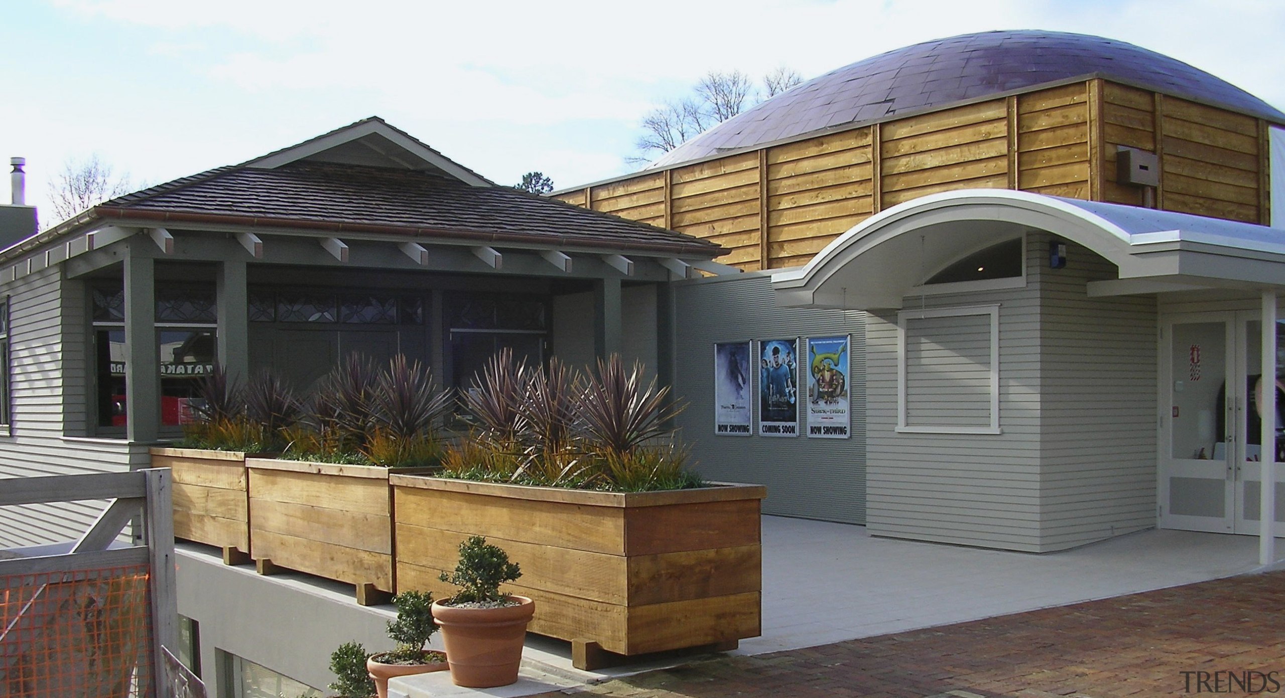 The new Matakana Cinema Complex acknowledges the architectural facade, home, house, property, real estate, roof, siding, window, gray