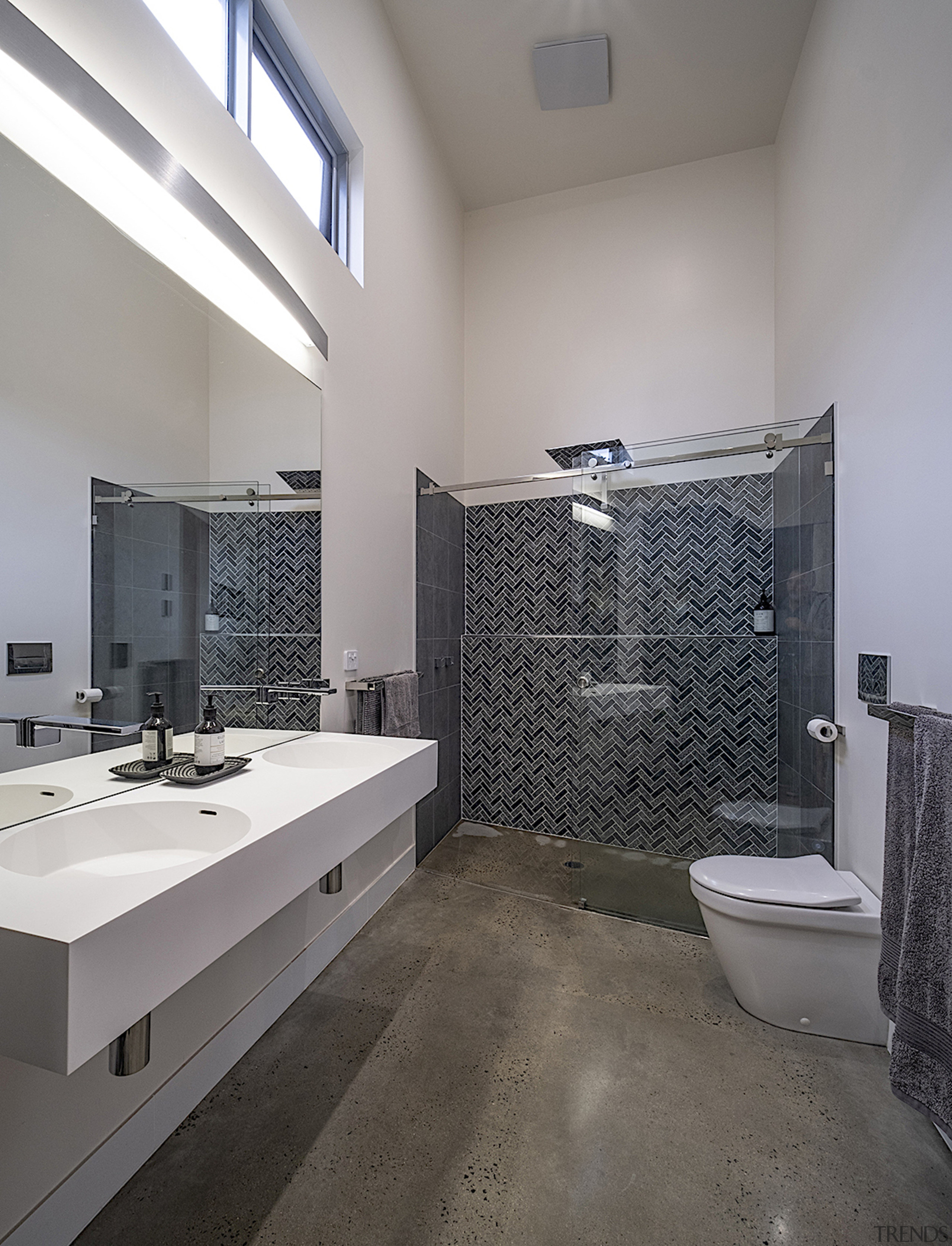 The high-ceilinged upper level master ensuite takes in 