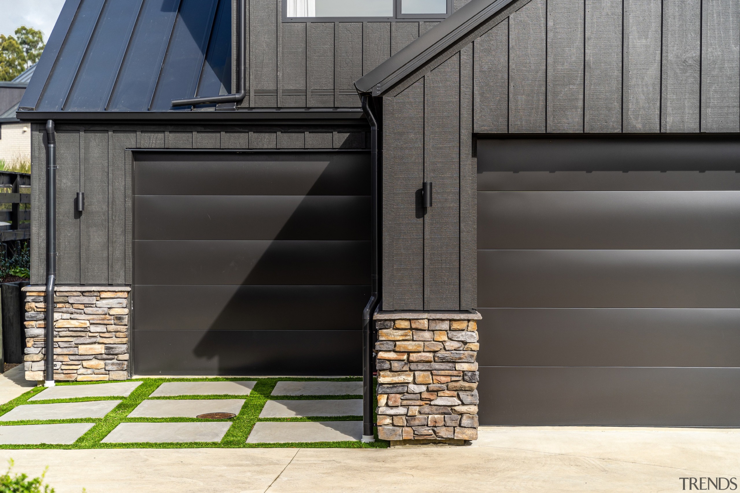 Two garages and two garage doors. - Black 