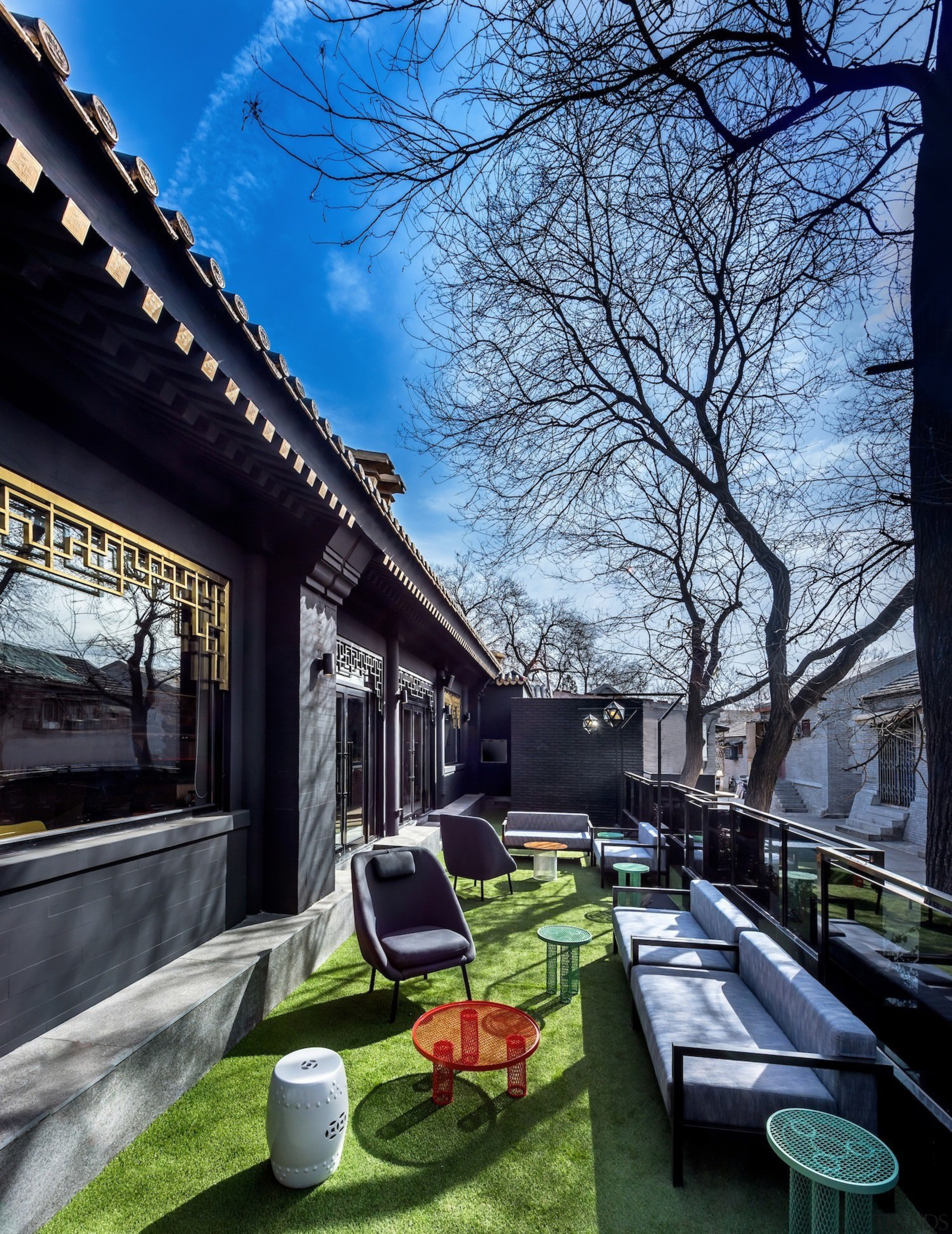 Outdoor seating areas take advantage of the sun architecture, building, car, home, house, neighbourhood, plant, residential area, roof, sky, tree, woody plant, black