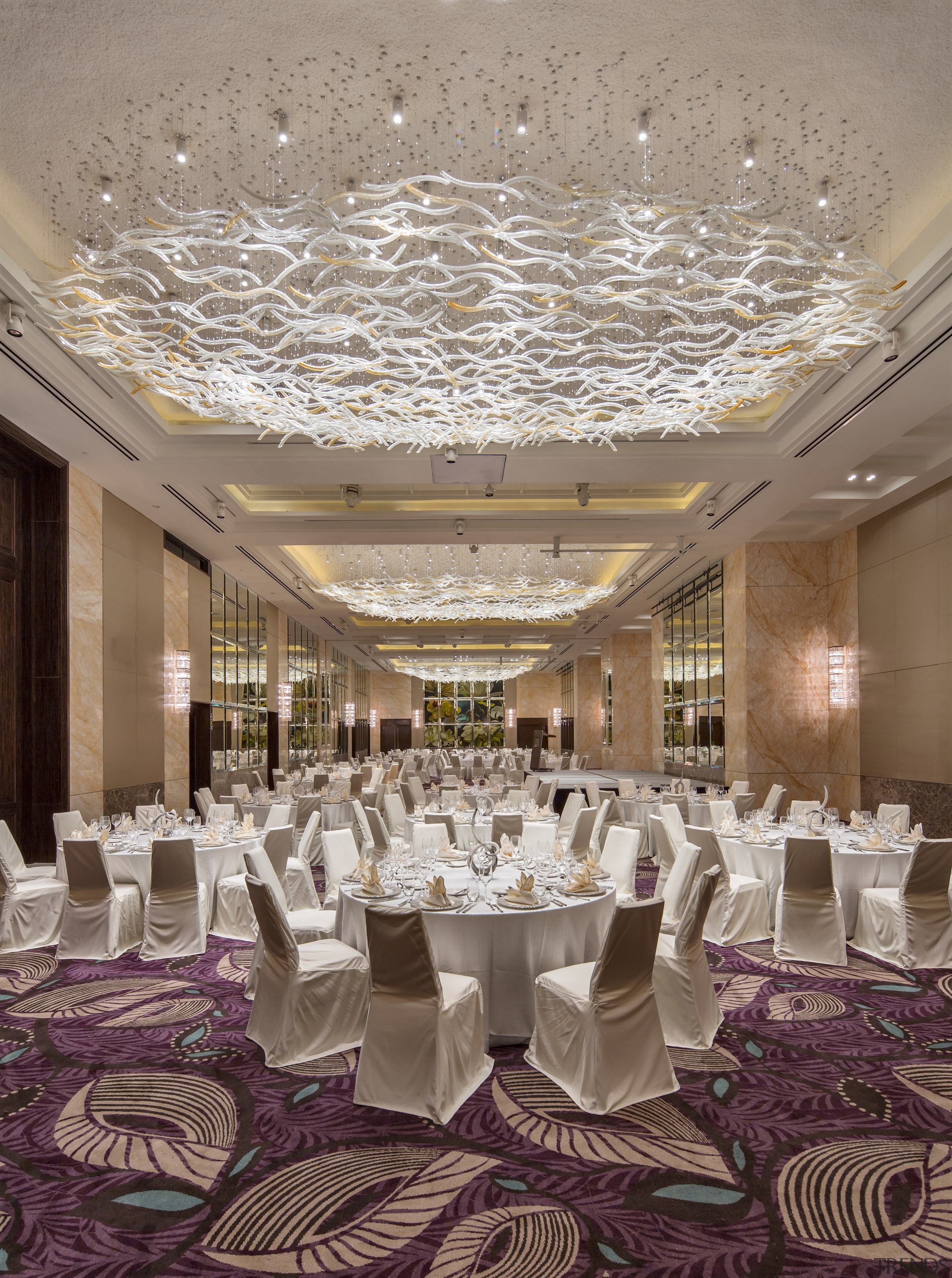 The grand ballroom features custom tubular glass lighting aisle, ballroom, banquet, ceiling, centrepiece, ceremony, function hall, interior design, restaurant, wedding reception, gray, brown