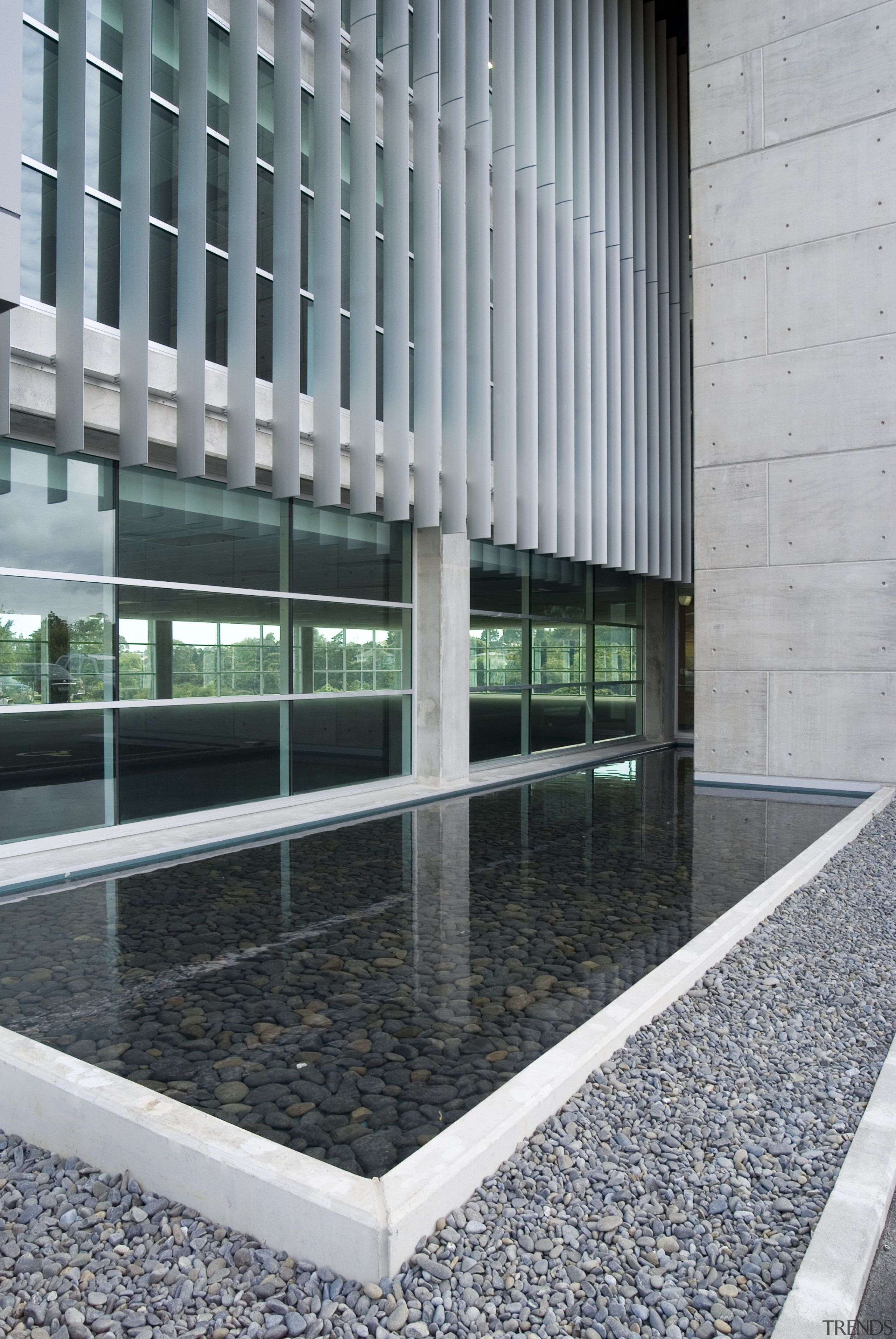 This sustainable office building in Auckland, the head architecture, building, condominium, facade, glass, window, gray