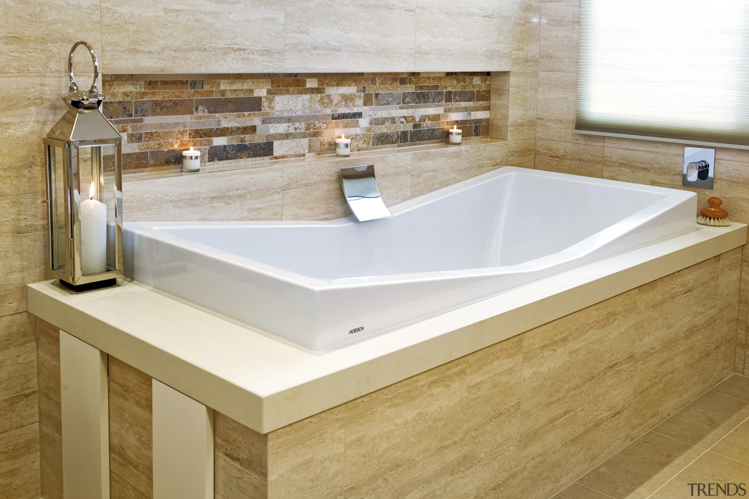 Close up view of this unique bathtub surrounded bathroom, bathroom sink, bathtub, countertop, floor, flooring, interior design, plumbing fixture, product design, sink, tap, tile, white, brown