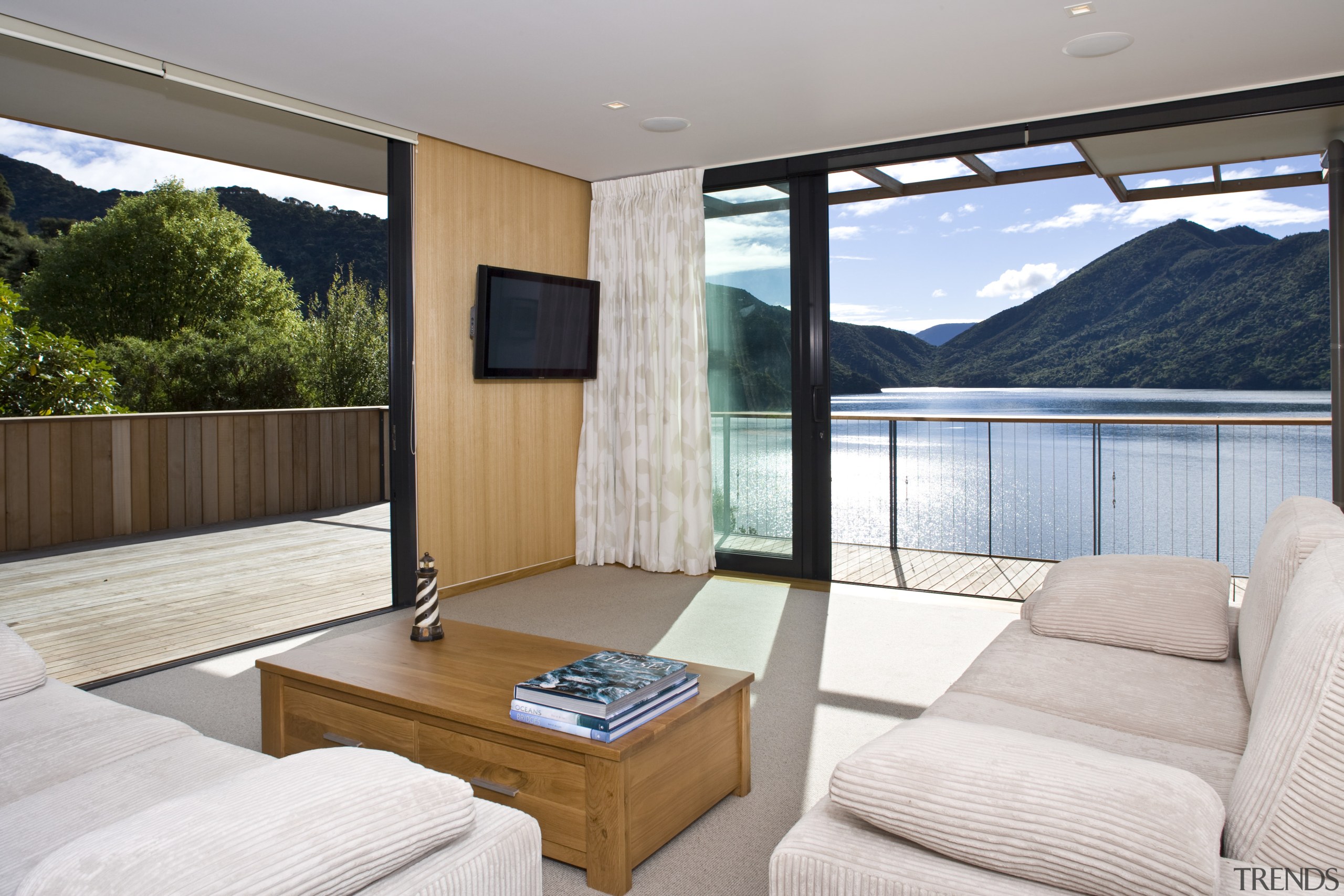 View of the lounge area which features carpeted estate, home, house, interior design, property, real estate, room, window, gray