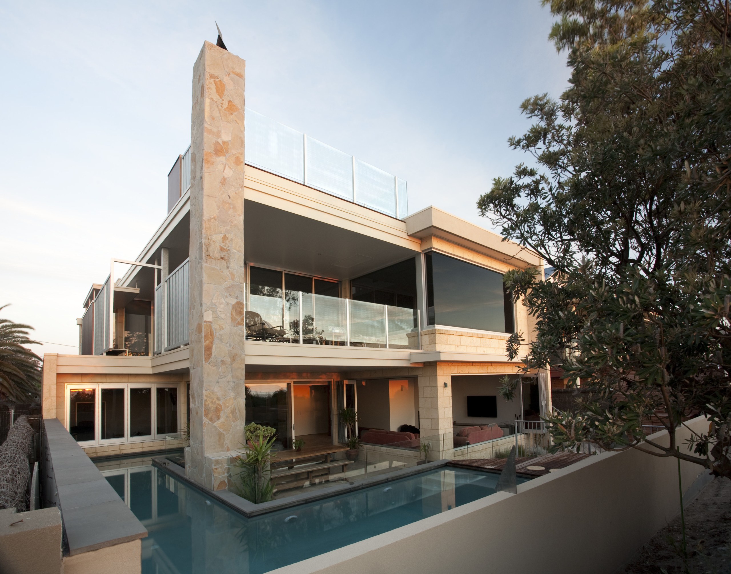 View of contemporary home with dark cabinetry, wooden apartment, architecture, building, facade, home, house, property, real estate, villa, black, white