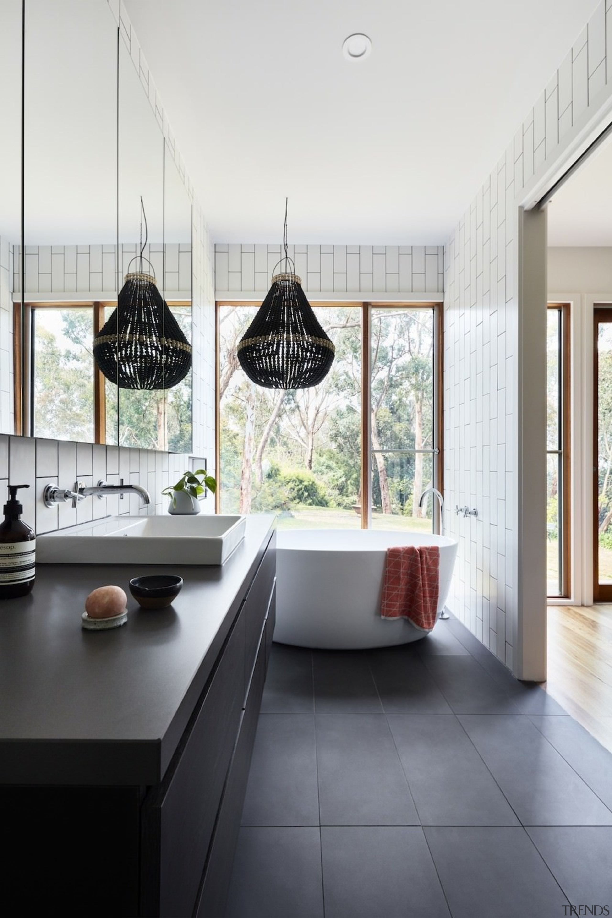 A view through the bathroom out to the architecture, ceiling, countertop, floor, flooring, home, house, interior design, kitchen, room, window, white