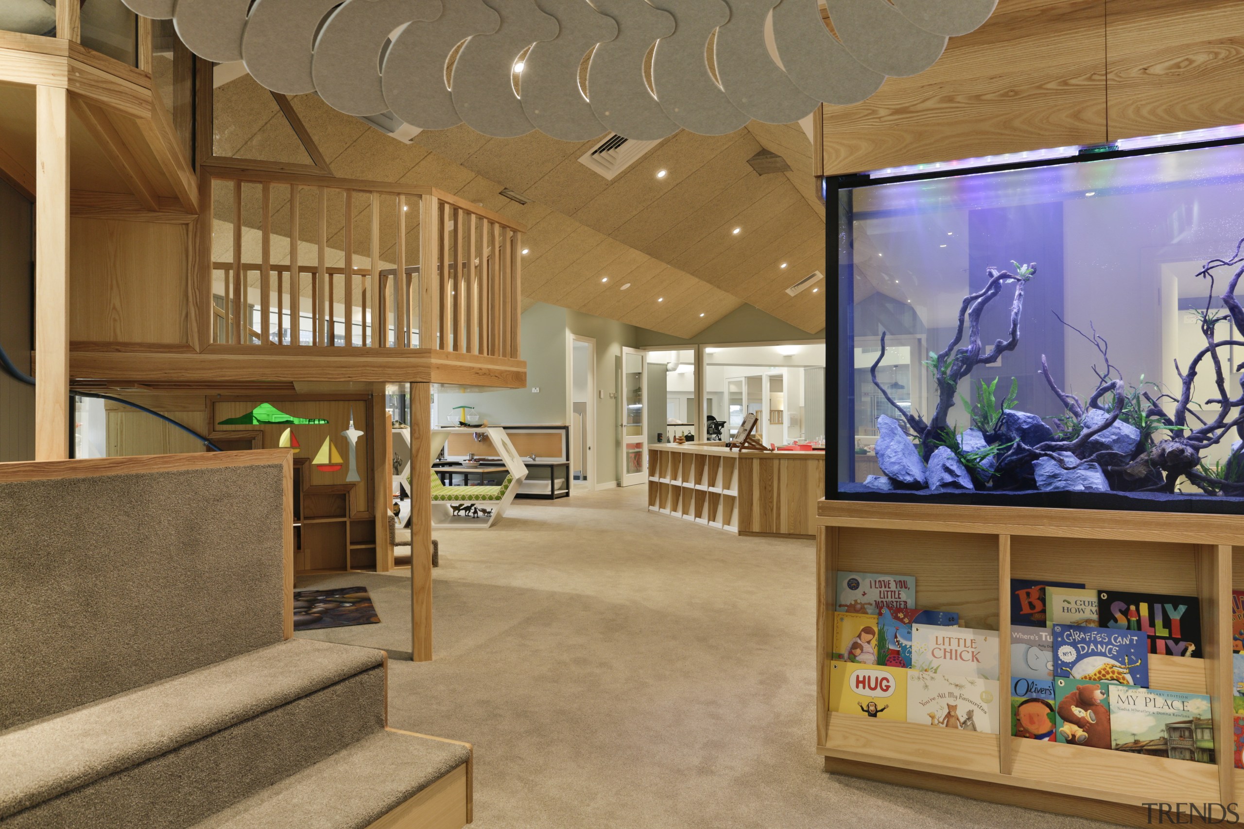 The fit-out of Cosmokids child centre provides a architecture, ceiling, interior design, lobby, real estate, brown, orange