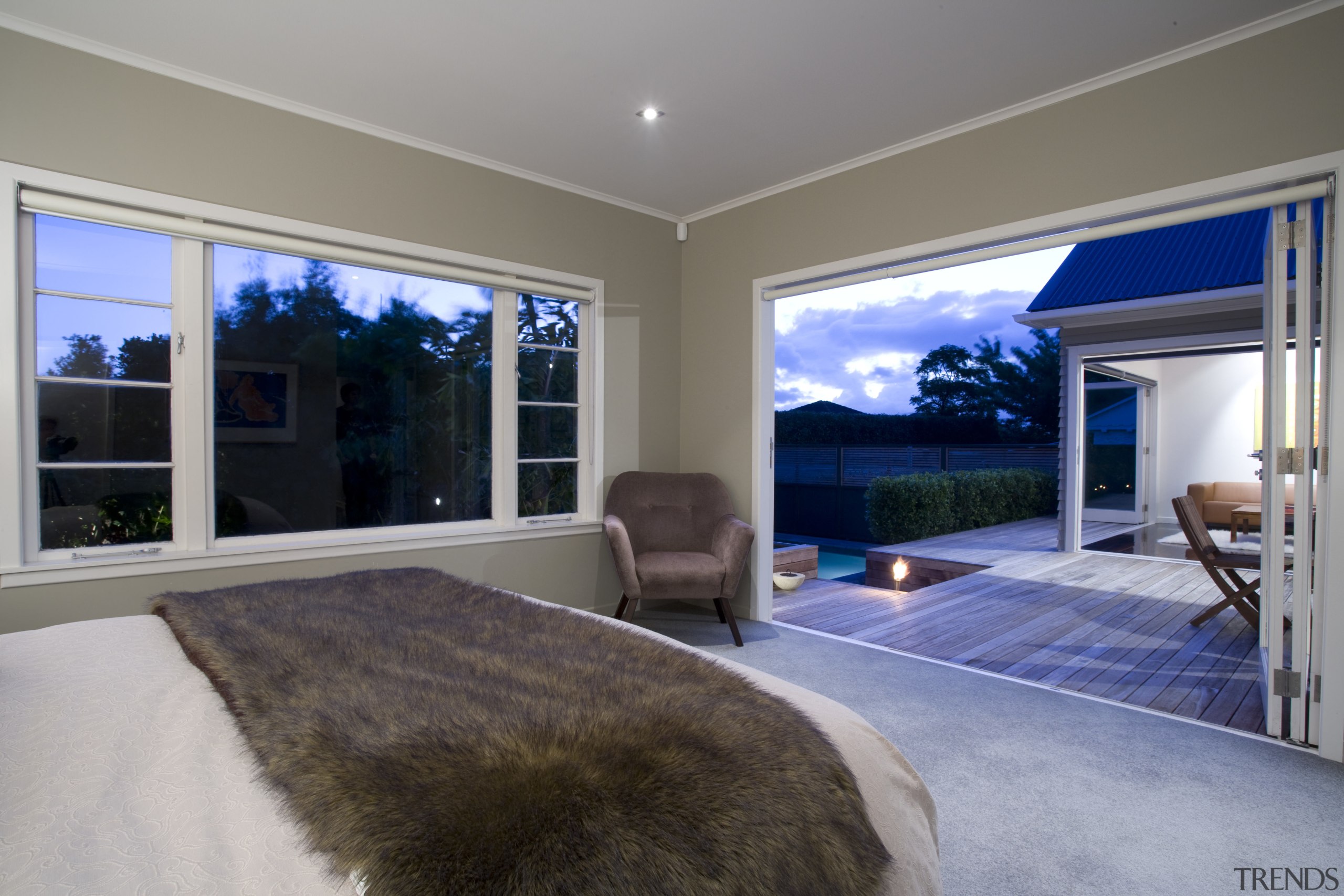 The new master bedroom opens onto the rear ceiling, estate, home, house, interior design, living room, property, real estate, room, wall, window, gray