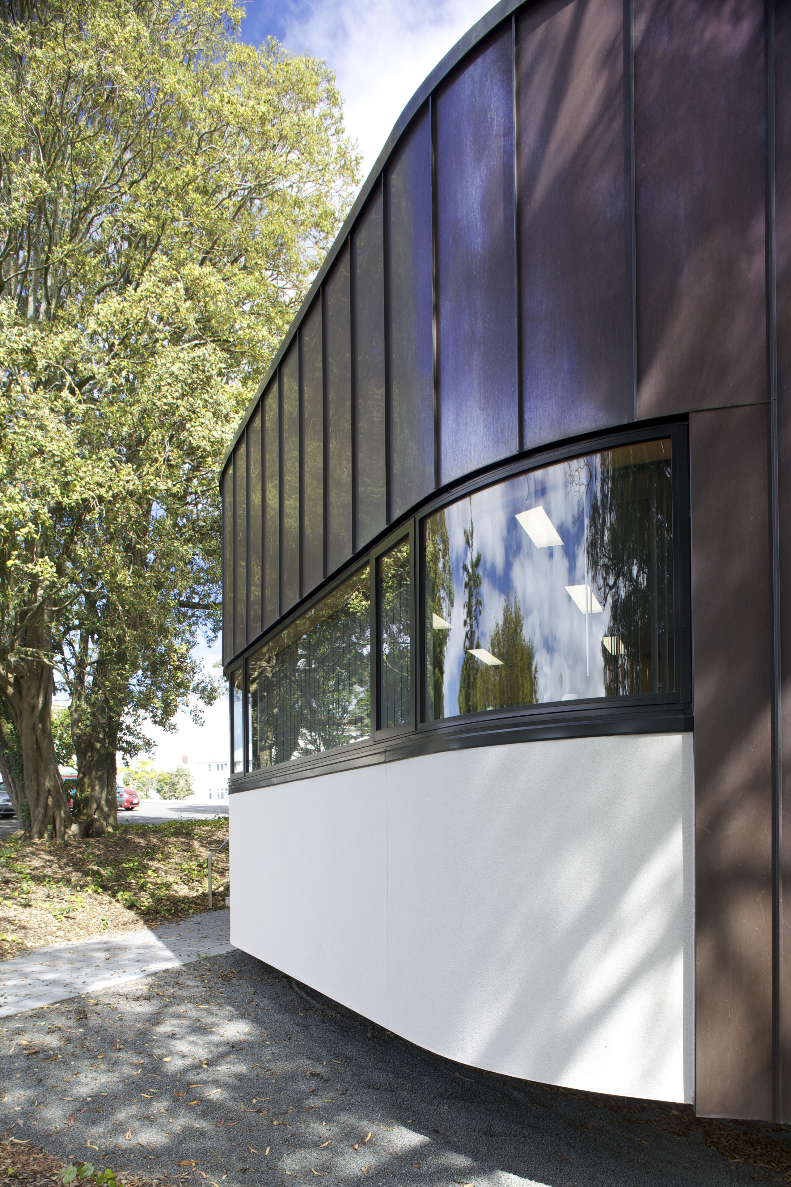 Exterior with curved windows. - Exterior with curved architecture, building, facade, house, window, black