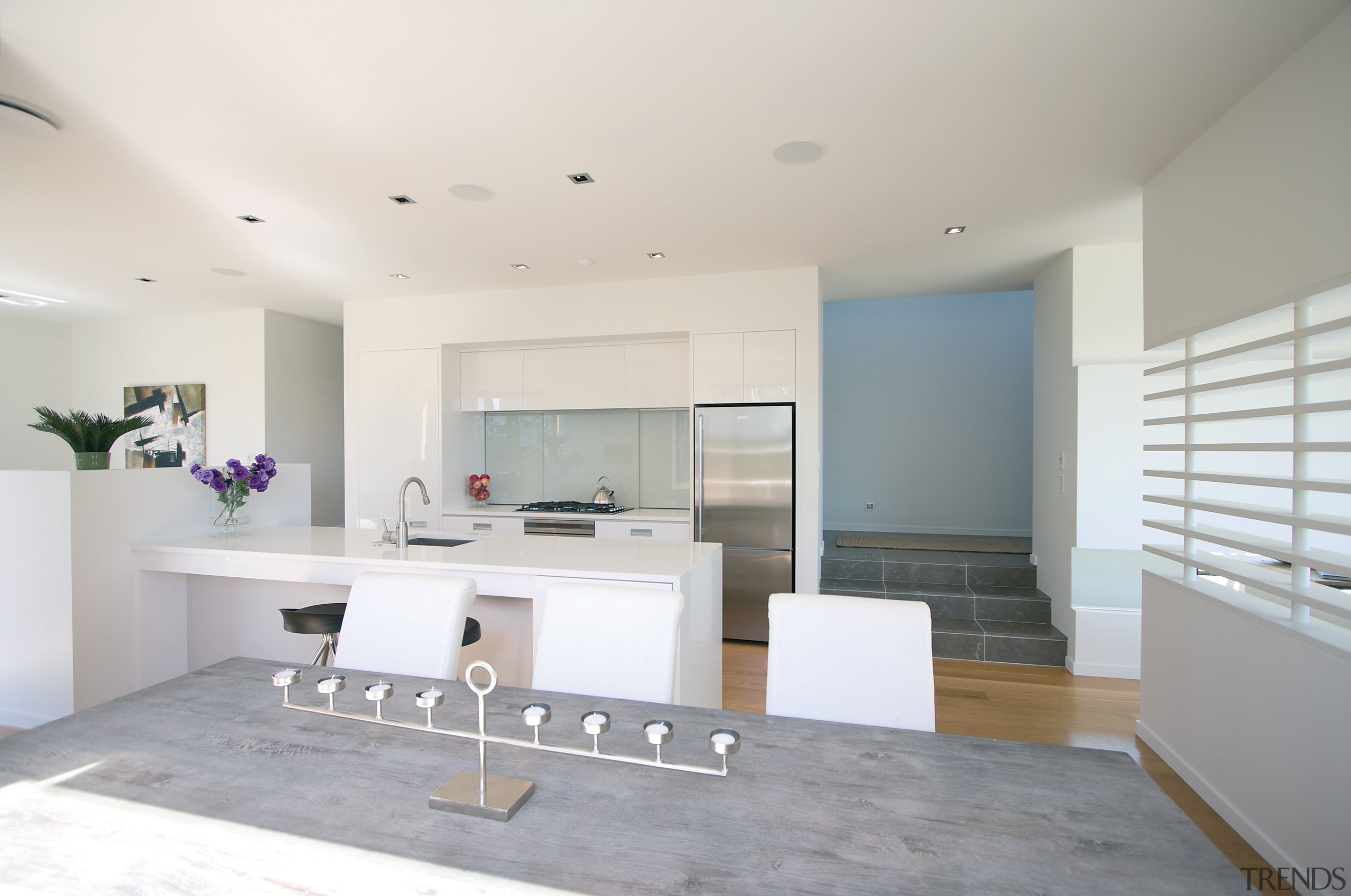 View of a kitchen and dining area designed architecture, house, interior design, kitchen, real estate, room, white, gray