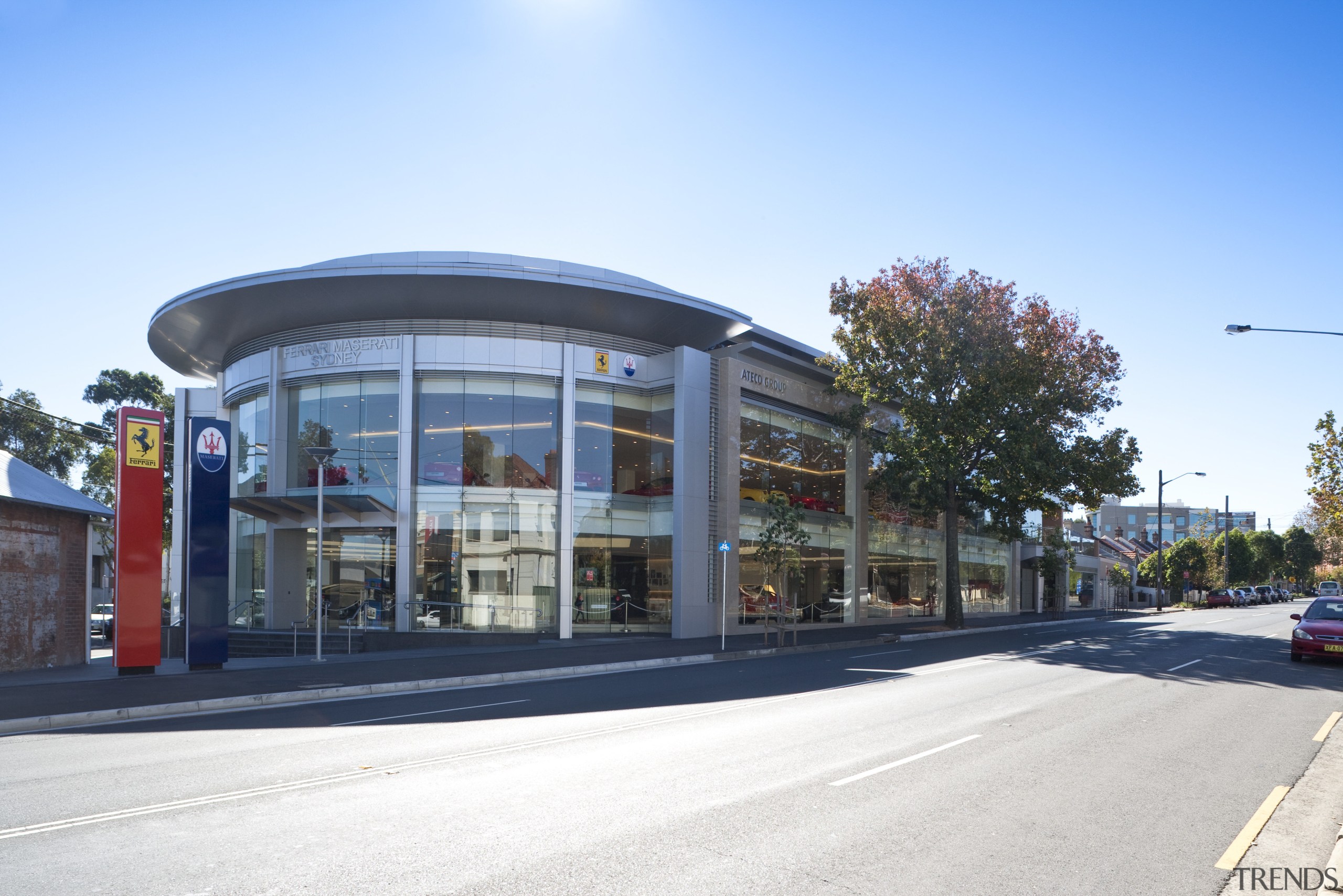 Exterior view of Ferrari Showroom - Exterior view architecture, building, city, commercial building, corporate headquarters, downtown, facade, metropolitan area, mixed use, neighbourhood, real estate, residential area, sky, white, teal