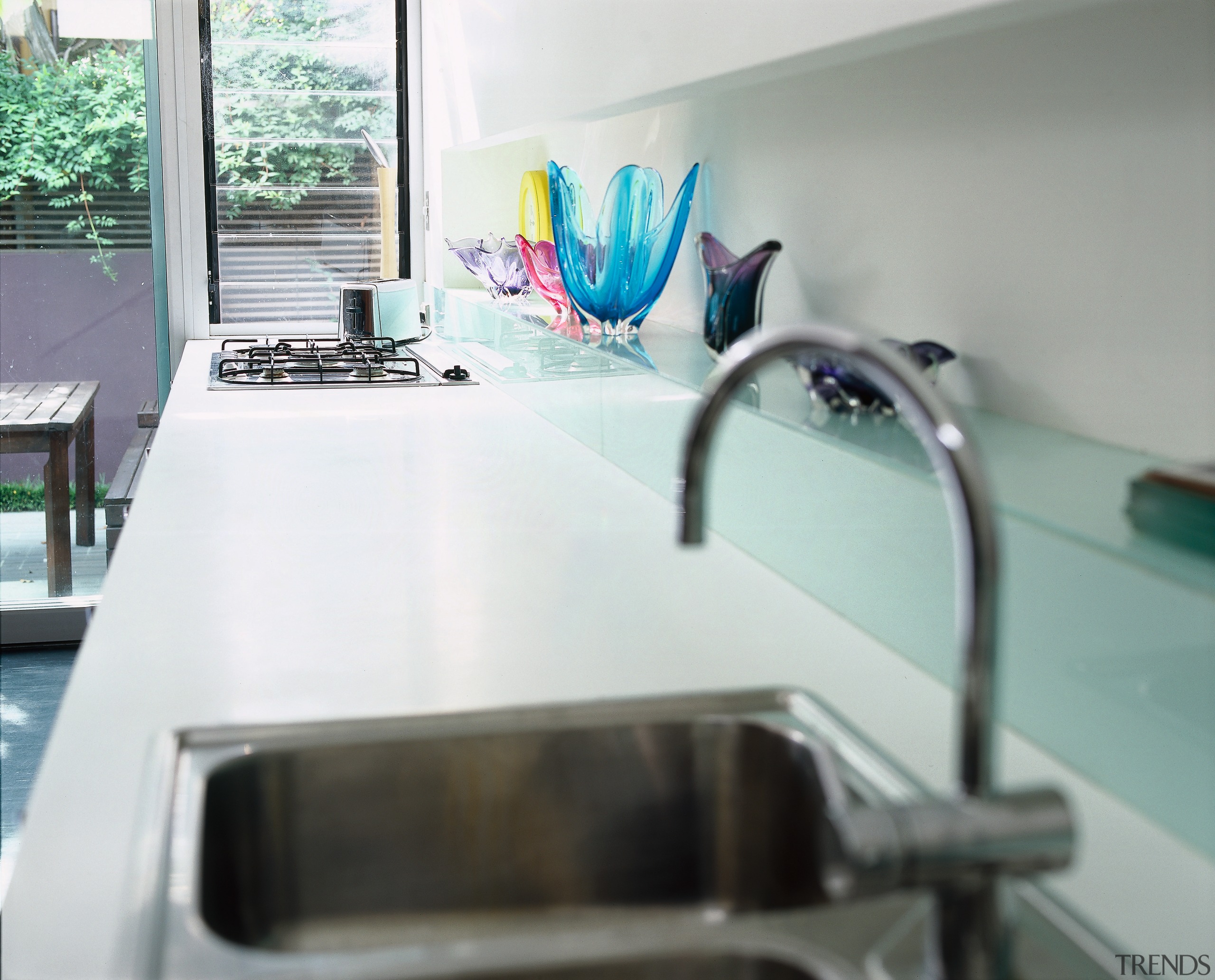 The detail of a sink and benchtop of countertop, furniture, glass, interior design, product design, table, tap, gray, white